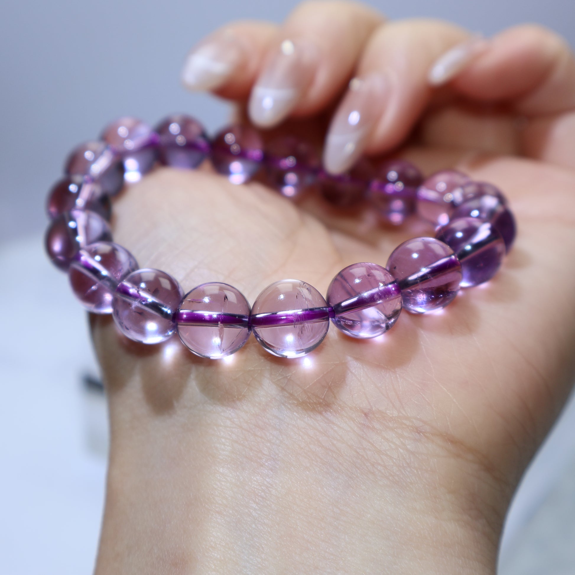 Angled wrist shot displaying even purple color and lustrous surface