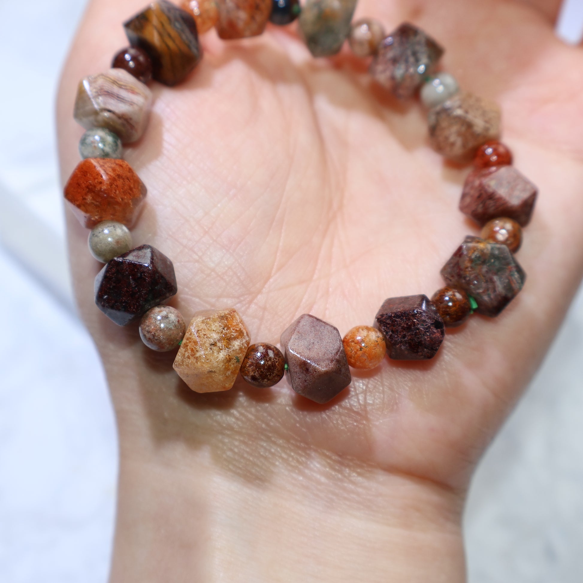 Macro shot of bead revealing moss-like inclusions