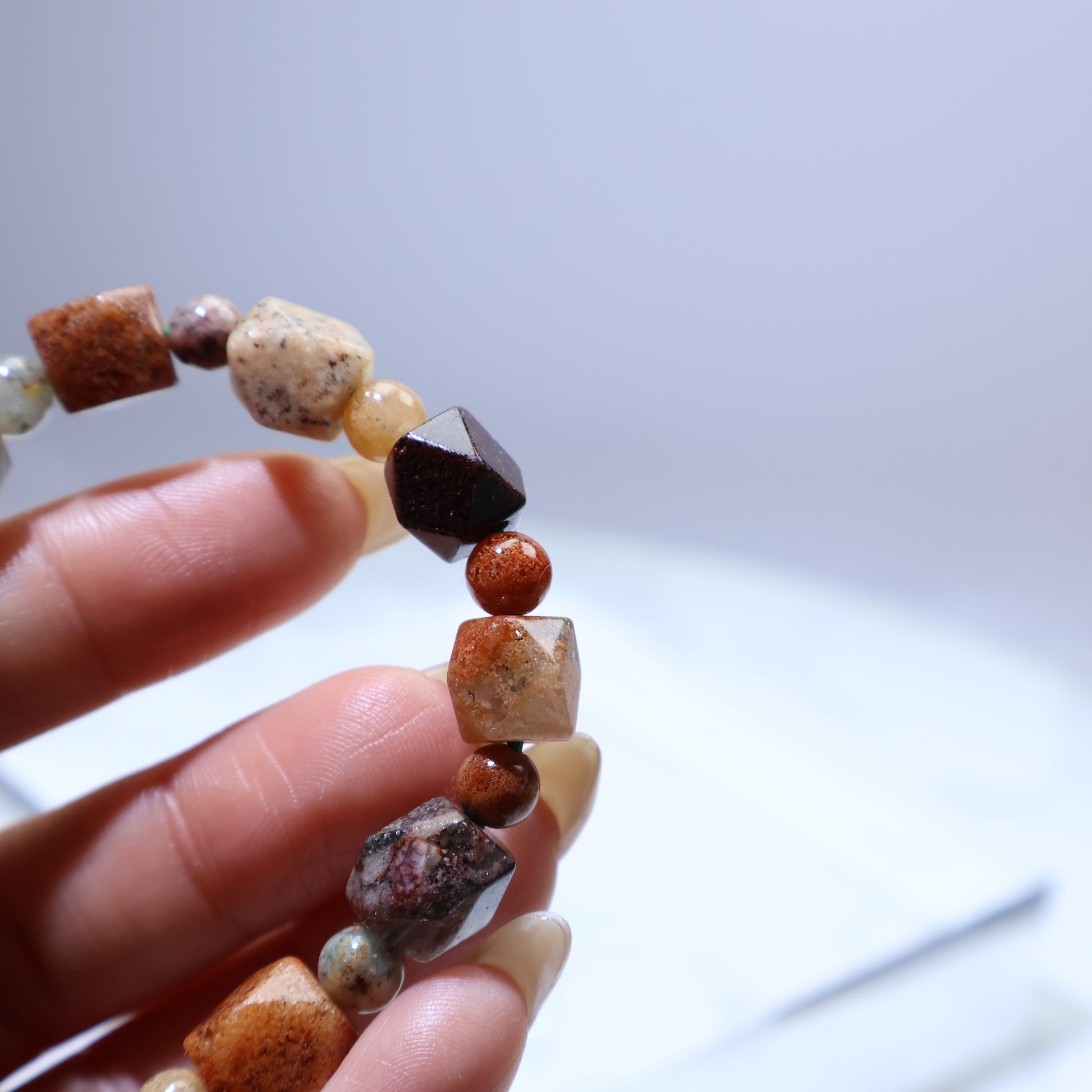 Detail shot focusing on transparency and natural inclusions in several beads