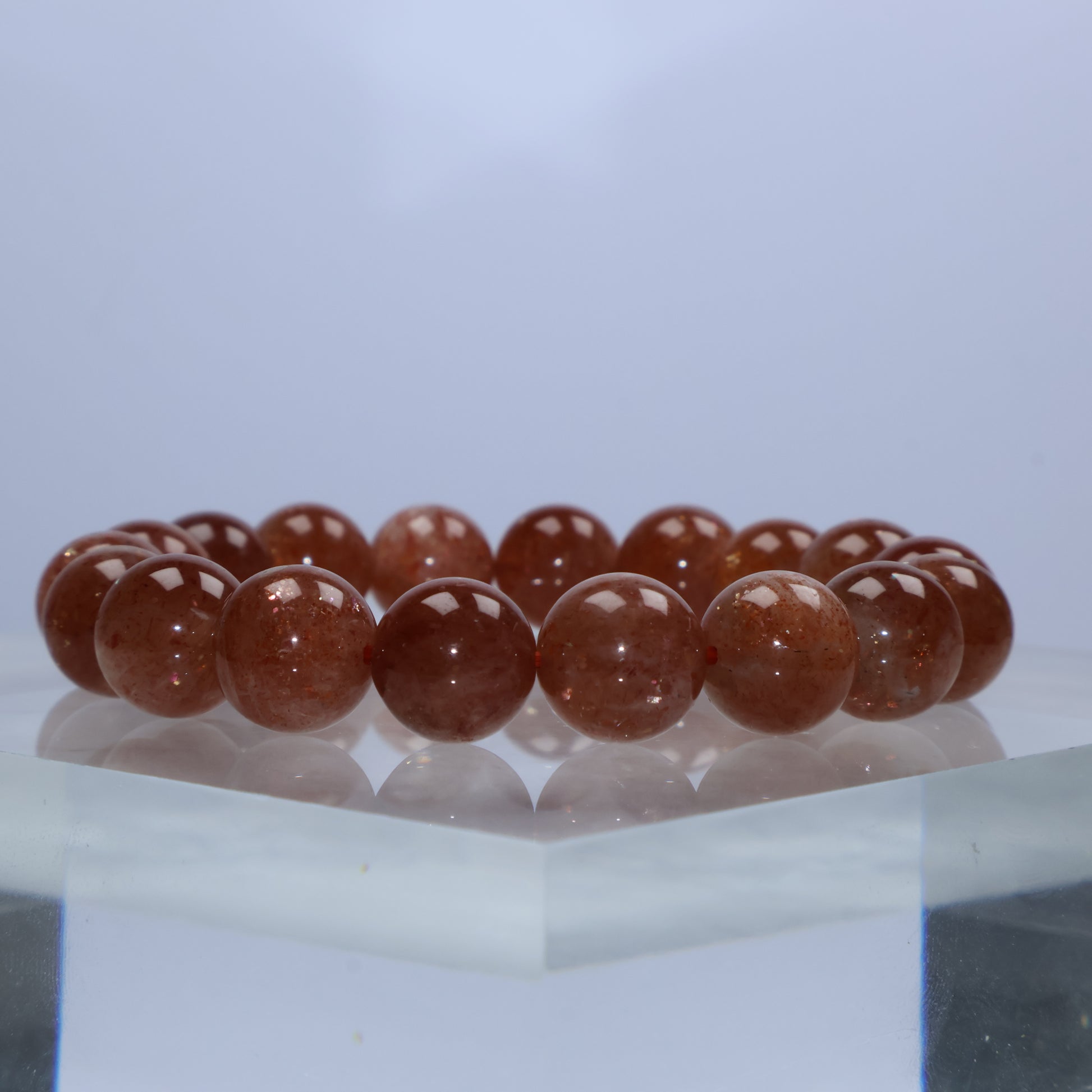 Front-facing view of Sunstone bracelet with warm brownish-orange glow