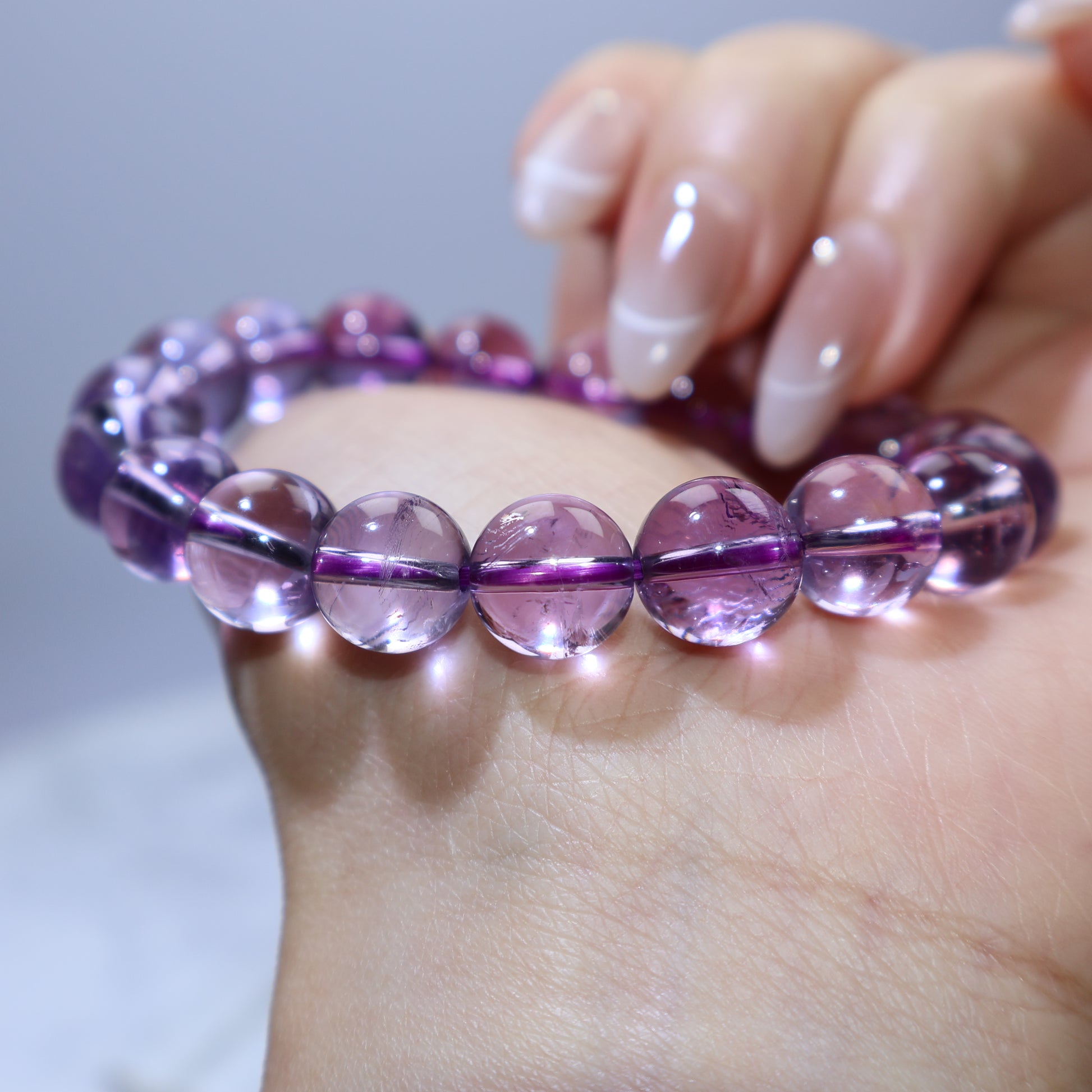 Side angle of bracelet on wrist highlighting clarity and shine