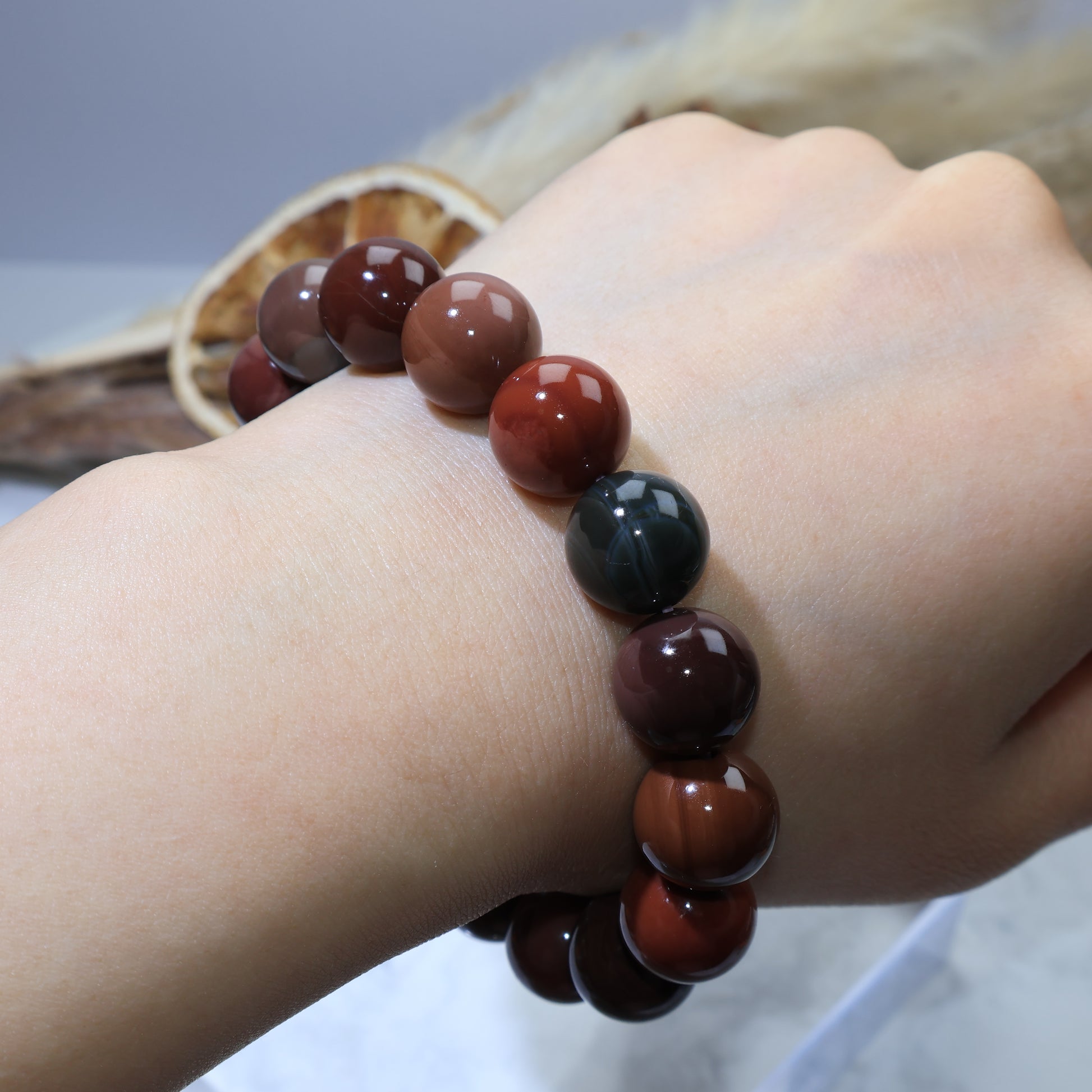 Full wrist view of Alxa Agate bracelet highlighting its earthy harmony