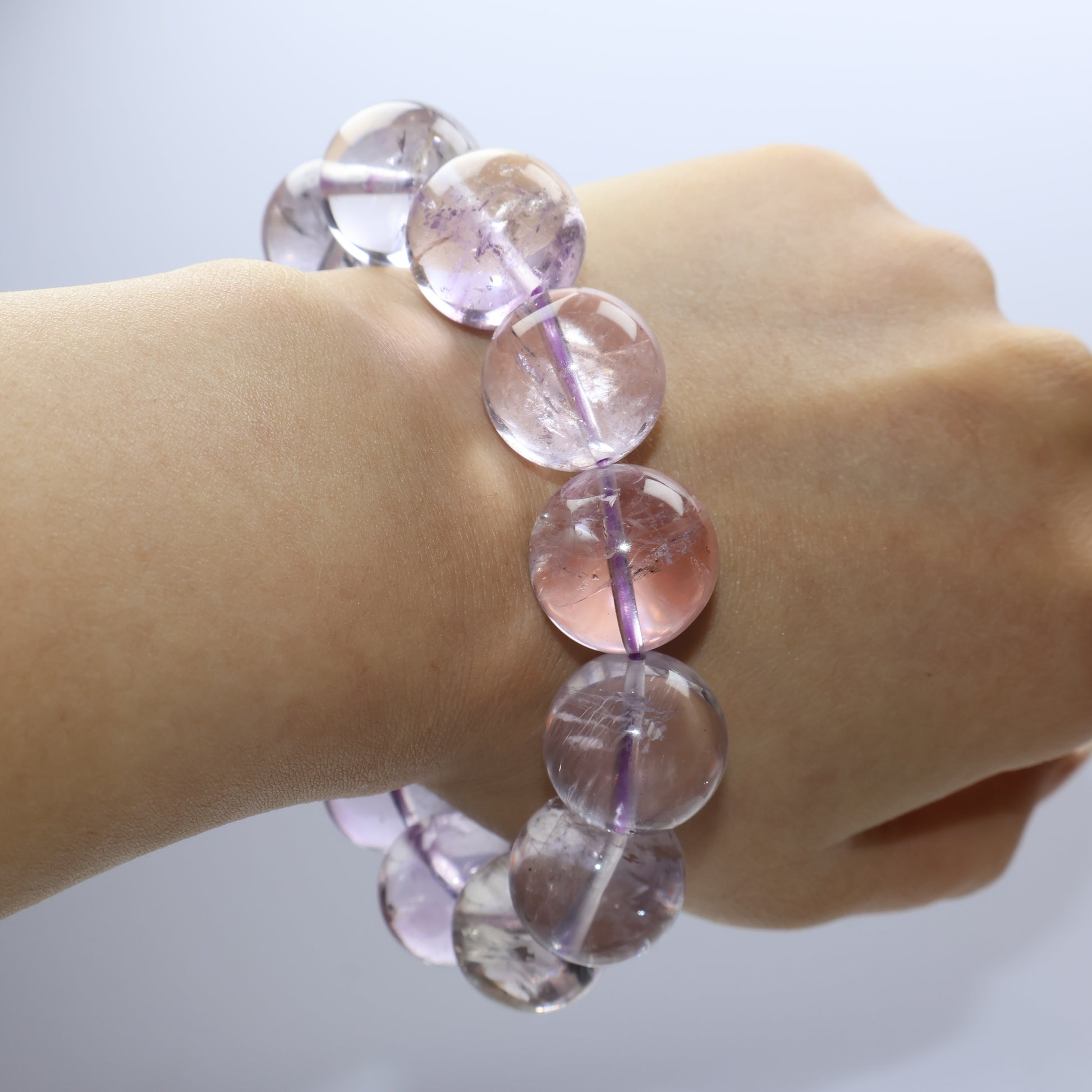 Worn on wrist – bold and elegant translucent purple crystal bracelet