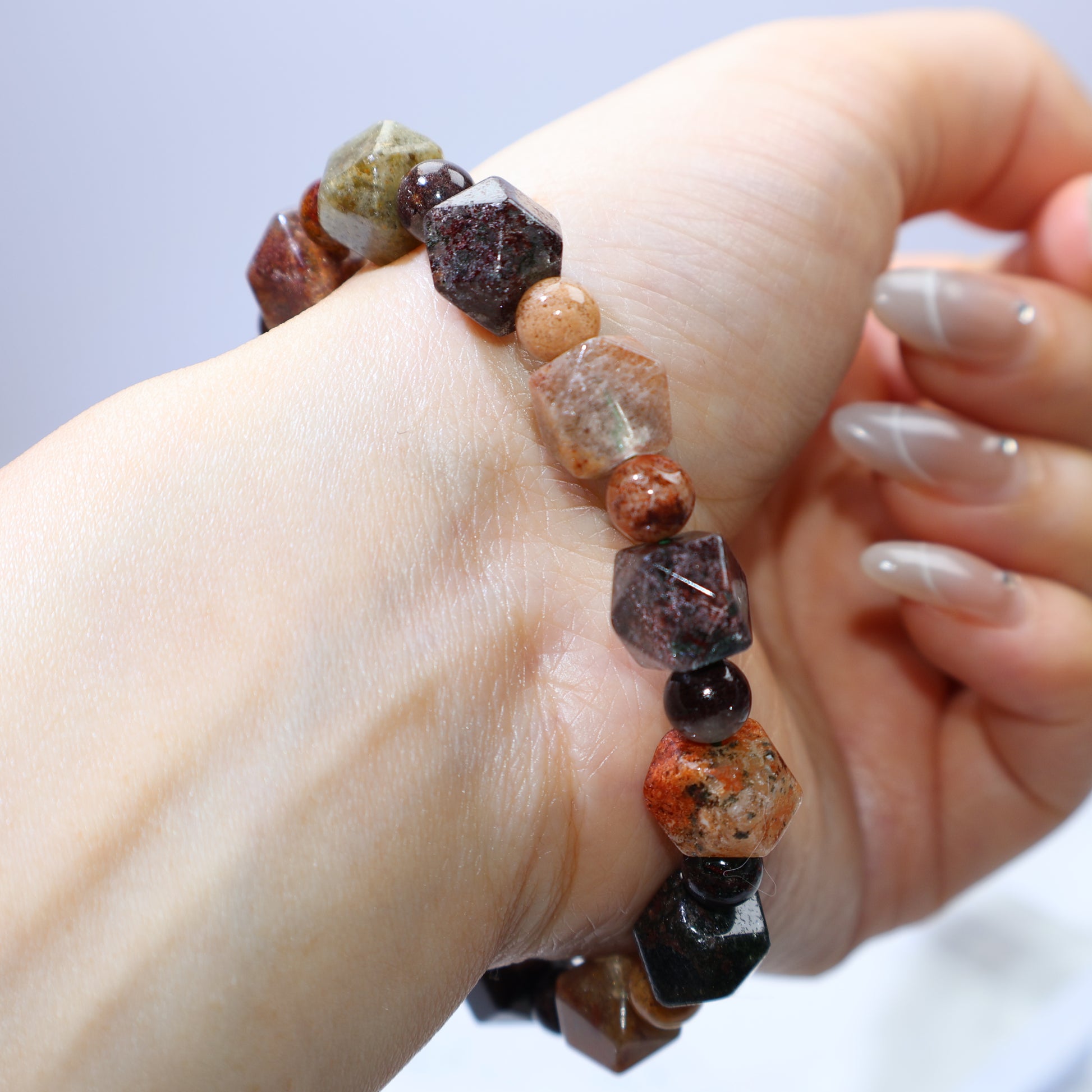 Macro close-up of multiple beads showing mineral density and color variation