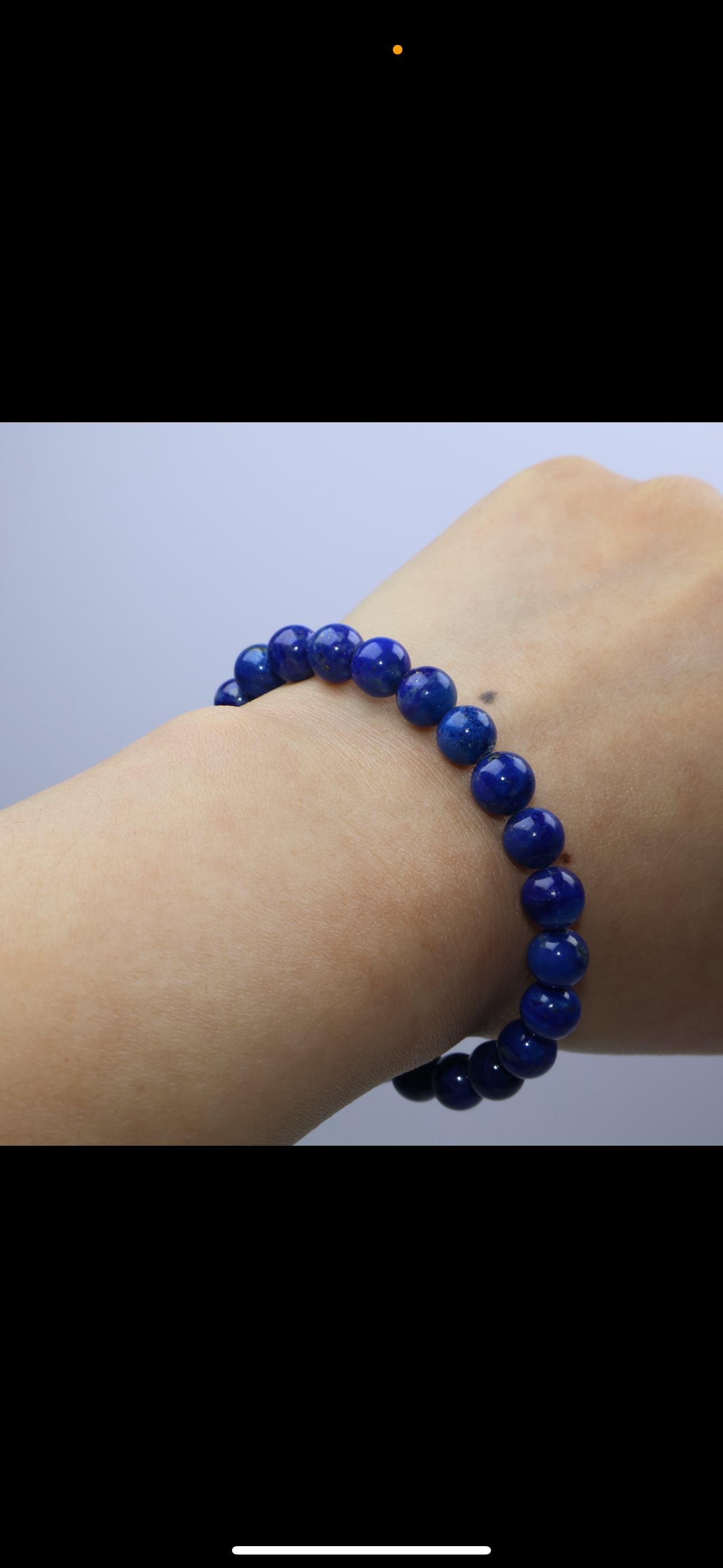 Wrist-wearing view of the 7mm lapis bracelet on a 15cm wrist