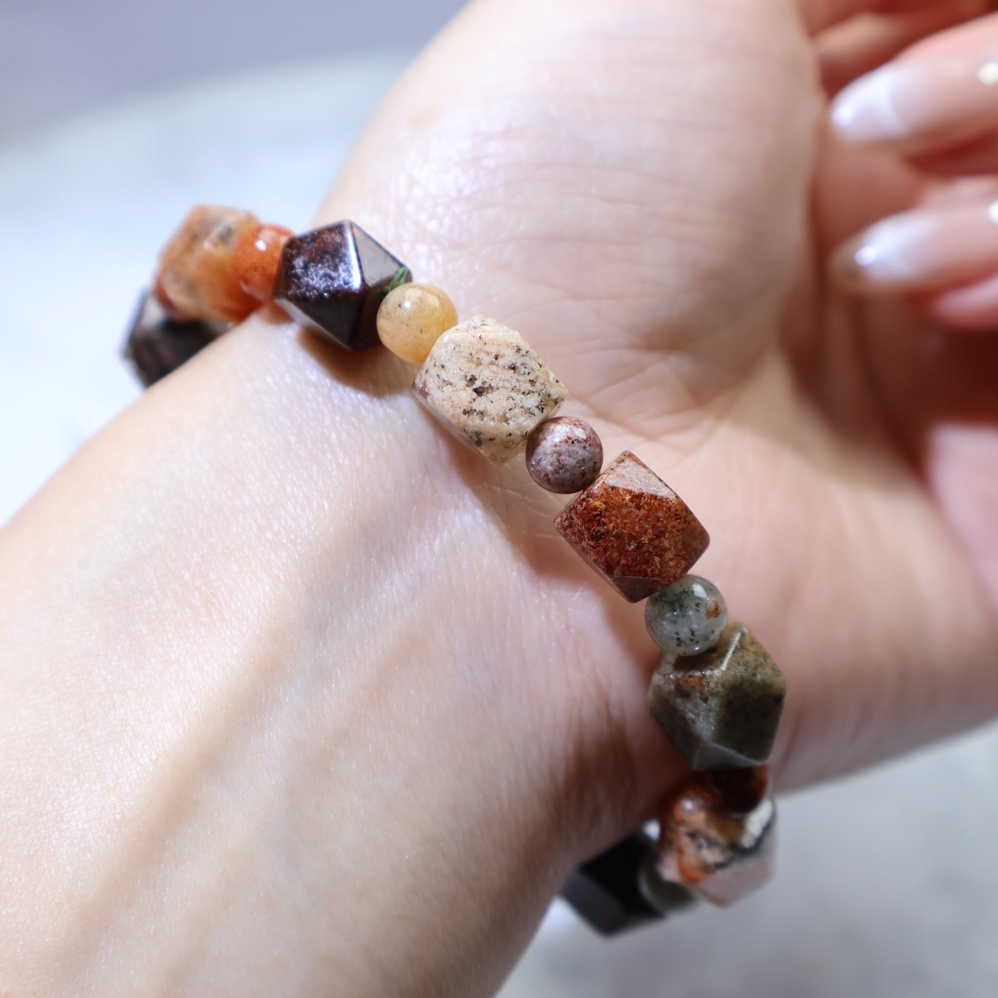 Another wrist angle emphasizing color variation from light sand to deep brown