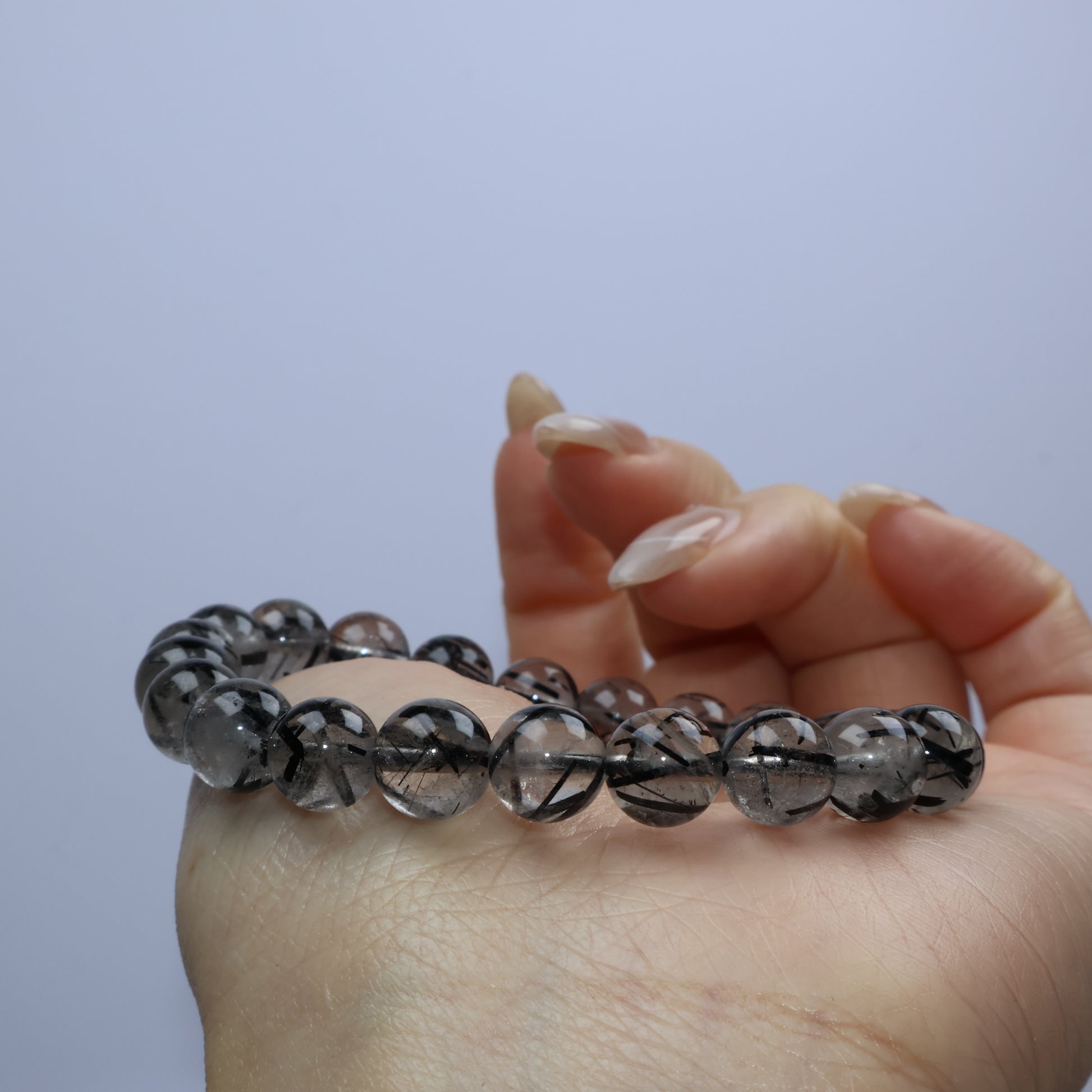 Horizontal wrist shot showing the entire bracelet against light skin tone