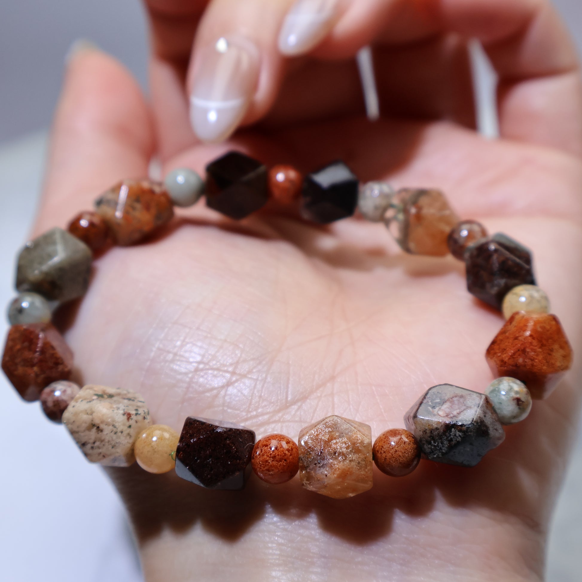 Low-angle close-up showing sparkly facets and garden-like inclusions