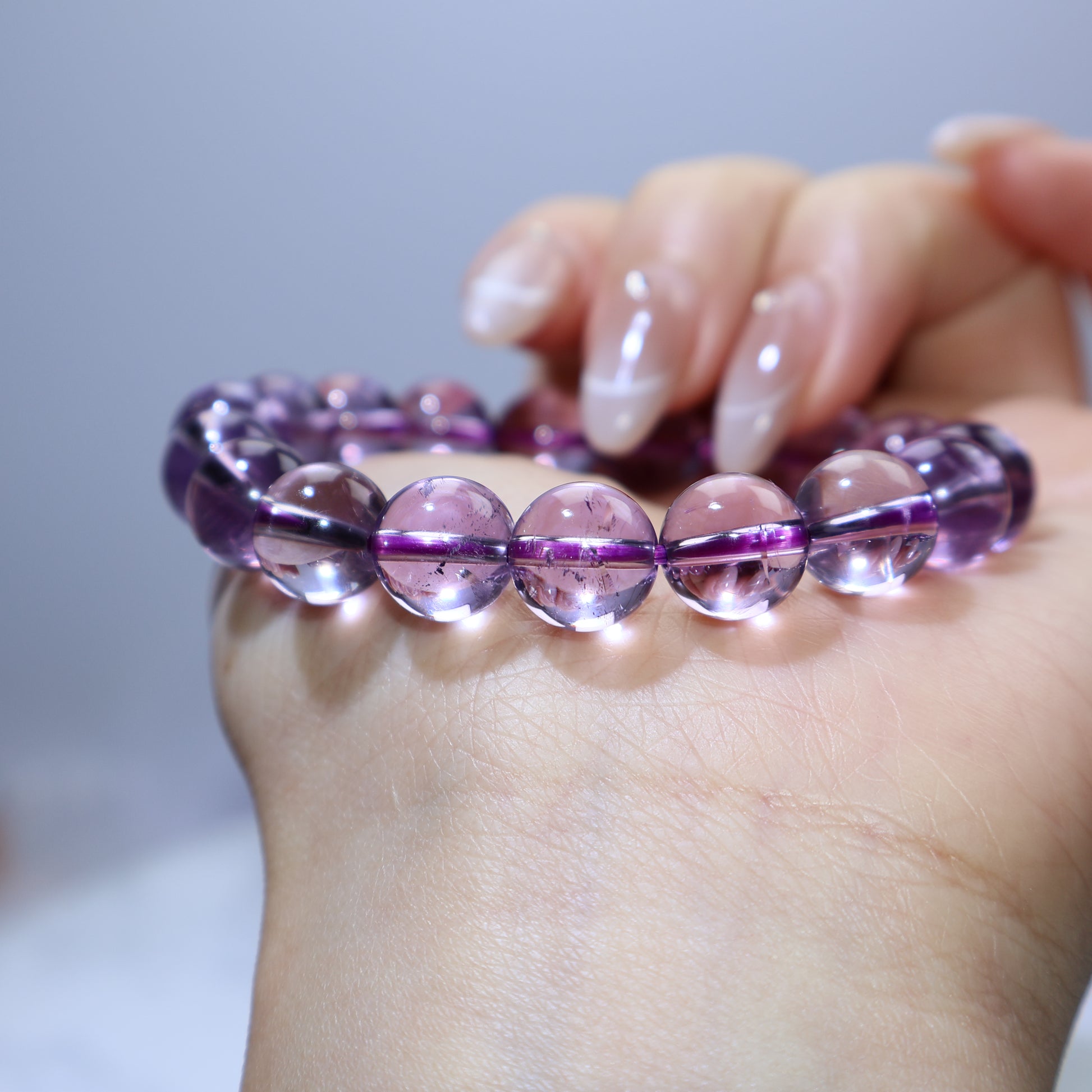 Close-up of beads showing smooth polish and natural internal patterns