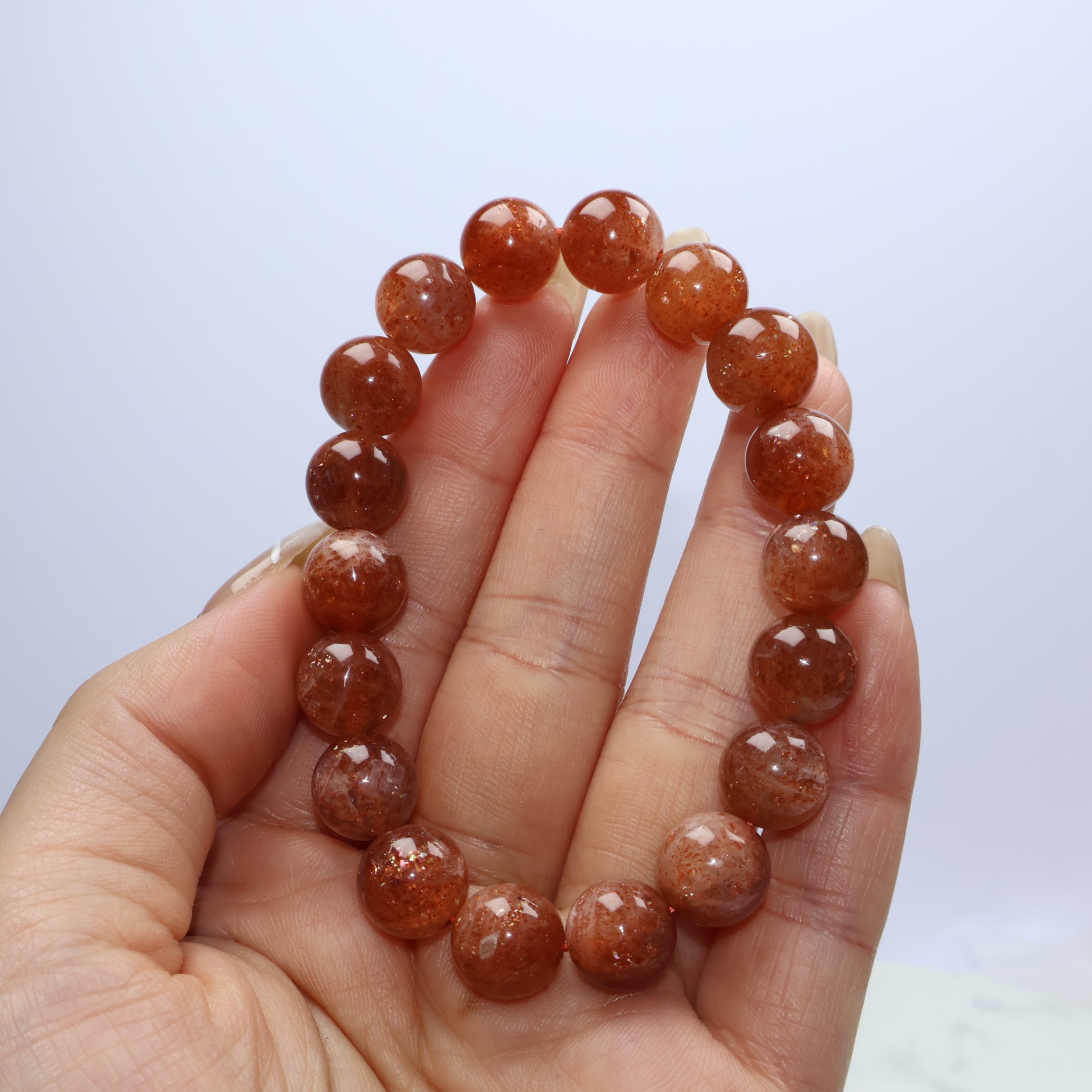 Handheld image showing bead quality and natural inclusions