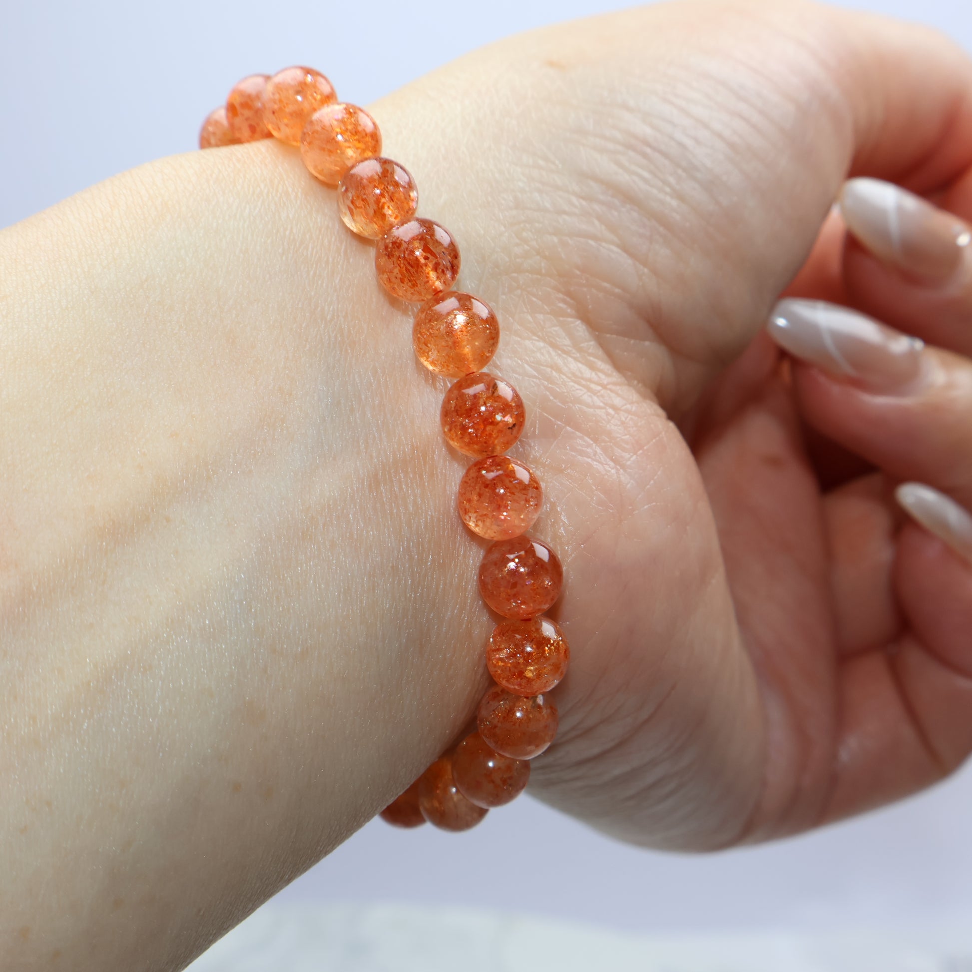 Wrist shot of Sunstone bracelet under soft light