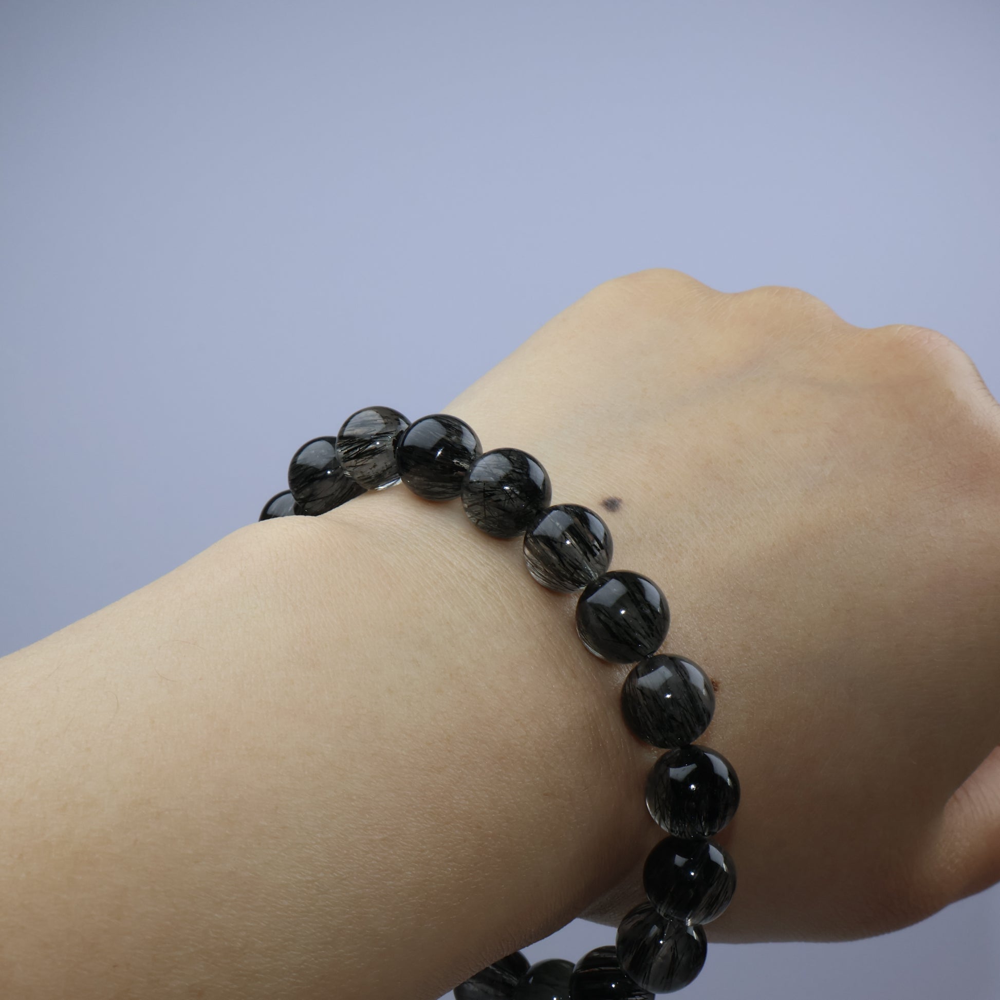 Back of hand shot showing complete loop of the bracelet