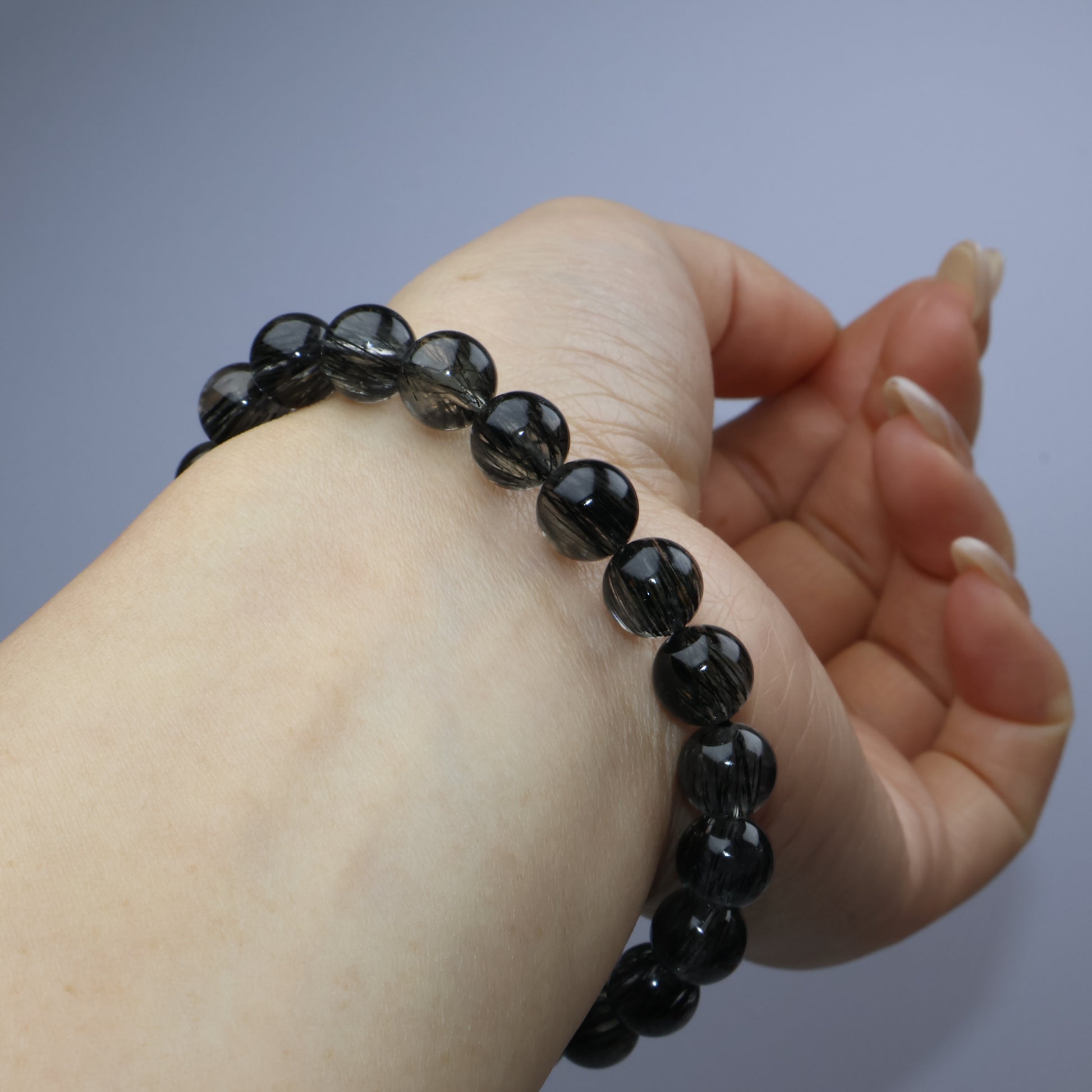 Angled wrist view highlighting aligned hair patterns and subtle transparency