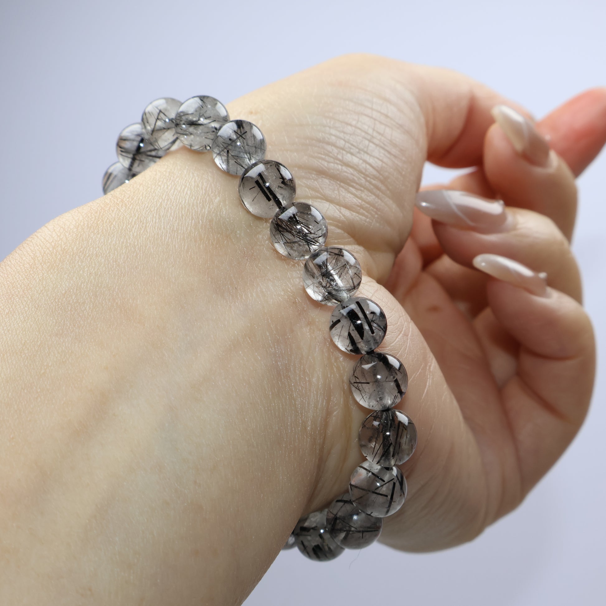 Horizontal wrist shot showing the entire bracelet against light skin tone