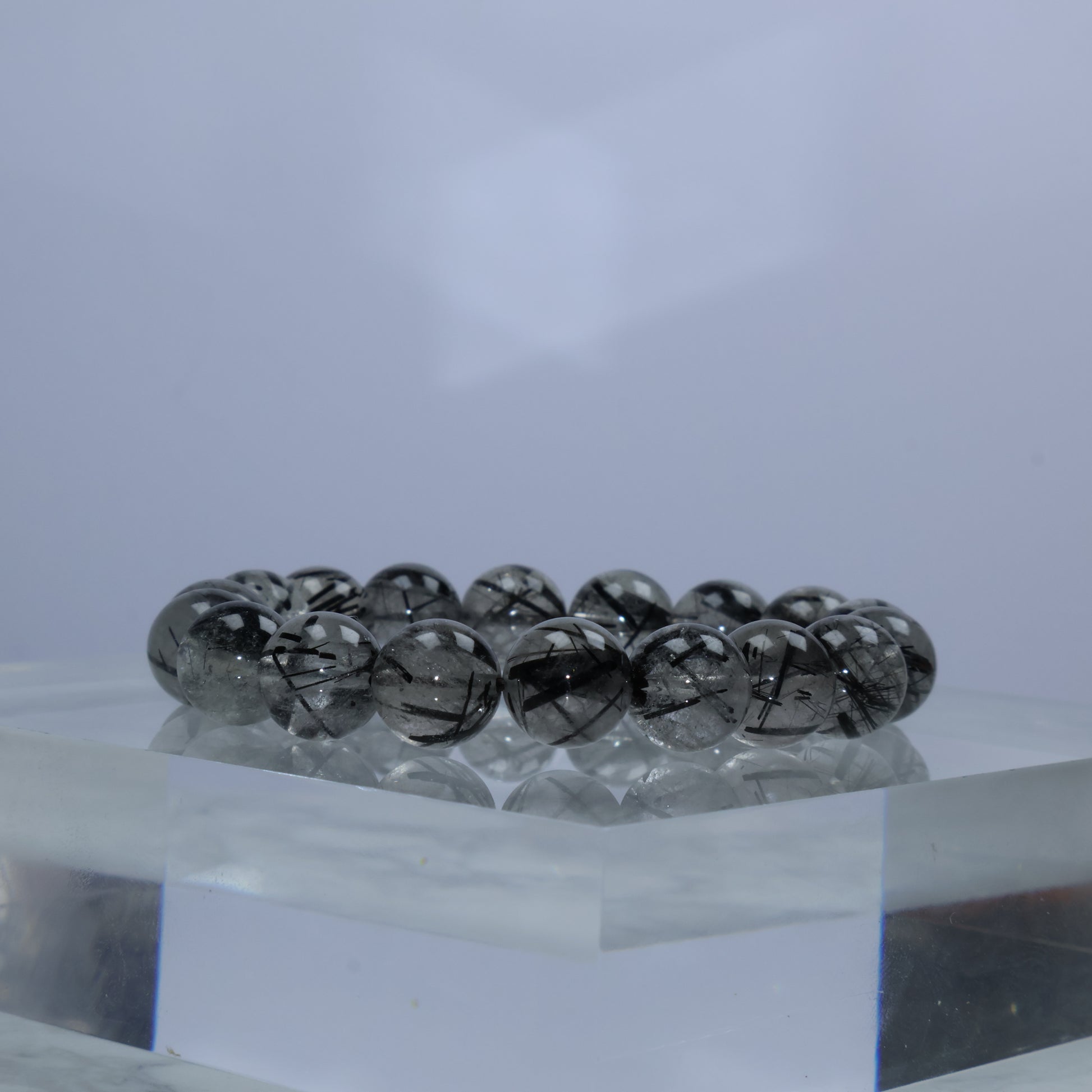 Side angle showing thick rutile lines and soft internal cotton texture