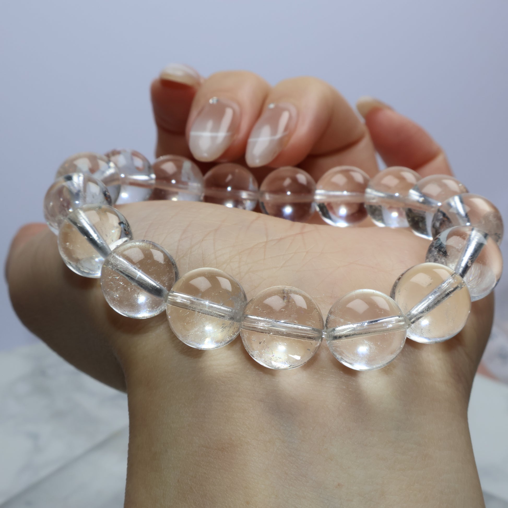 Close-up of bracelet draped across the wrist, displaying inner textures