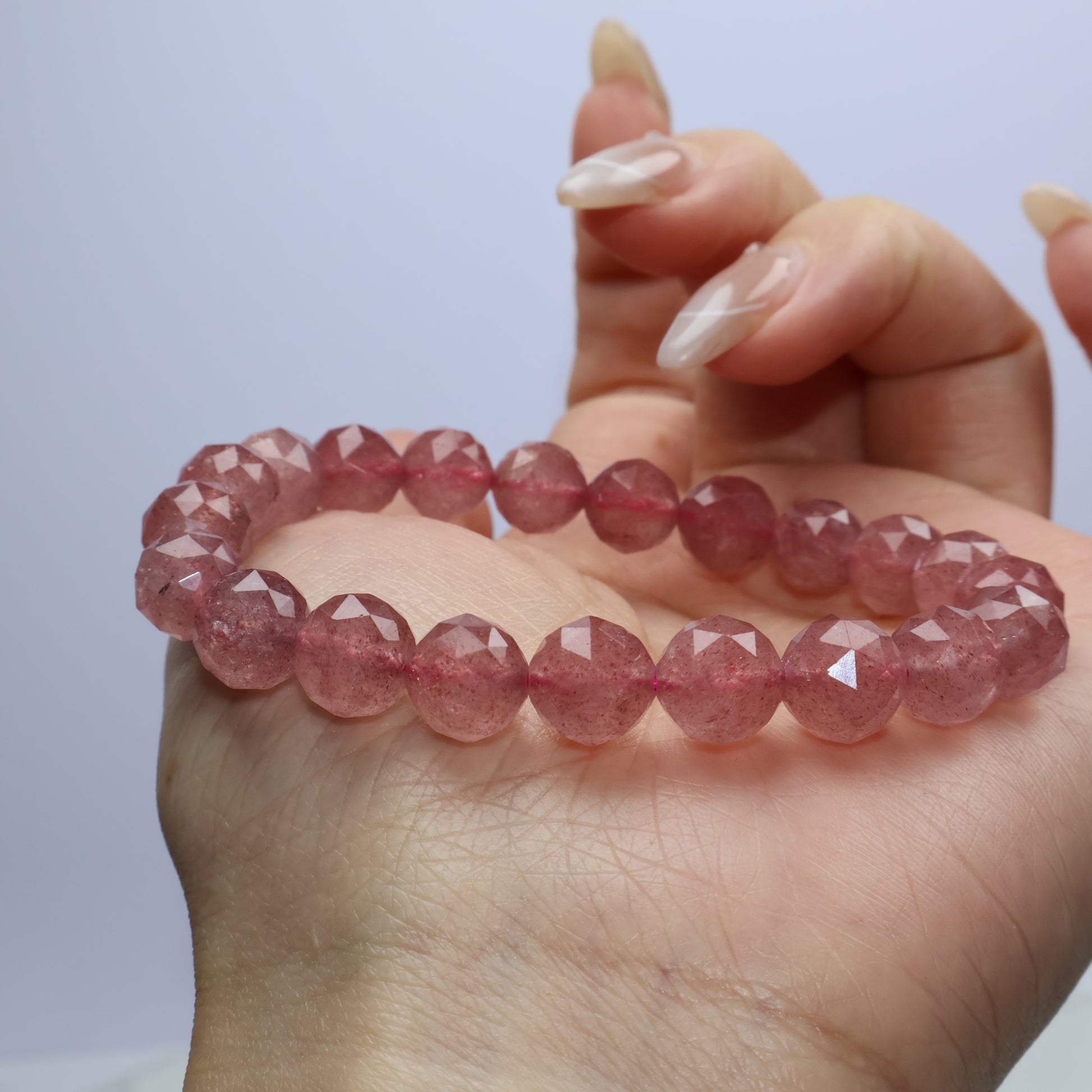 Side angle on hand showing sparkle and bead clarity