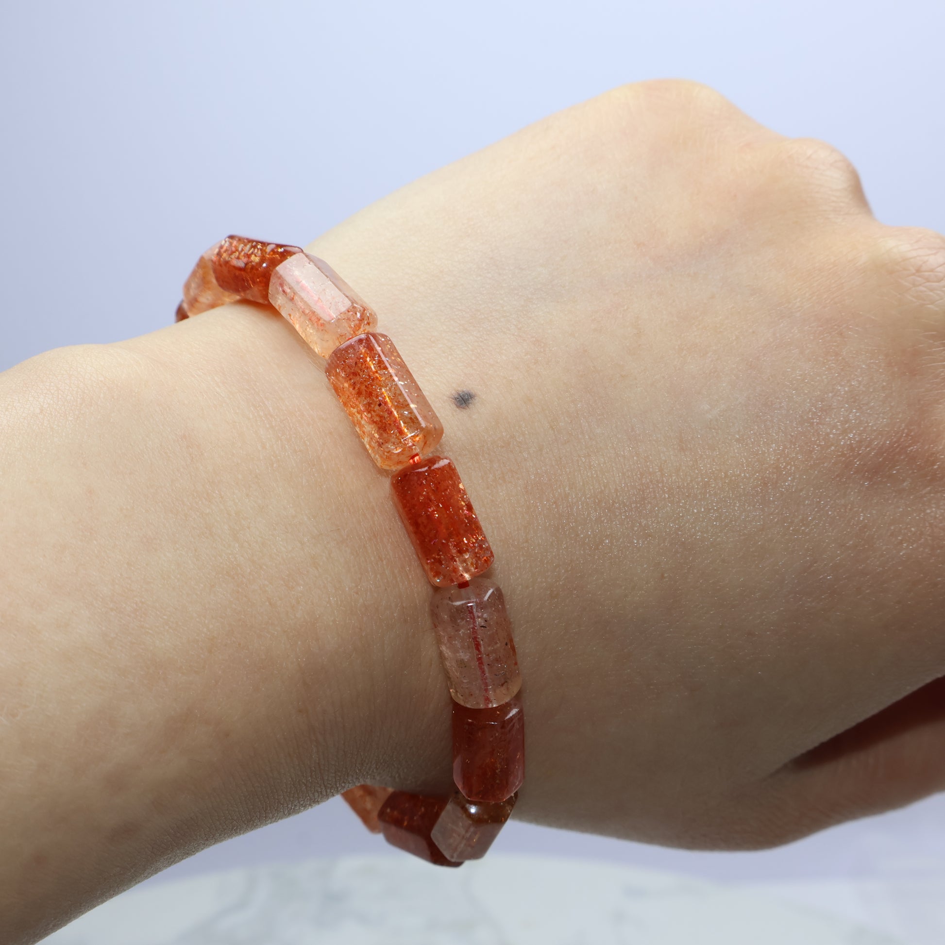 Wrist shot wearing the Sunstone bracelet, showing how the beads fit naturally