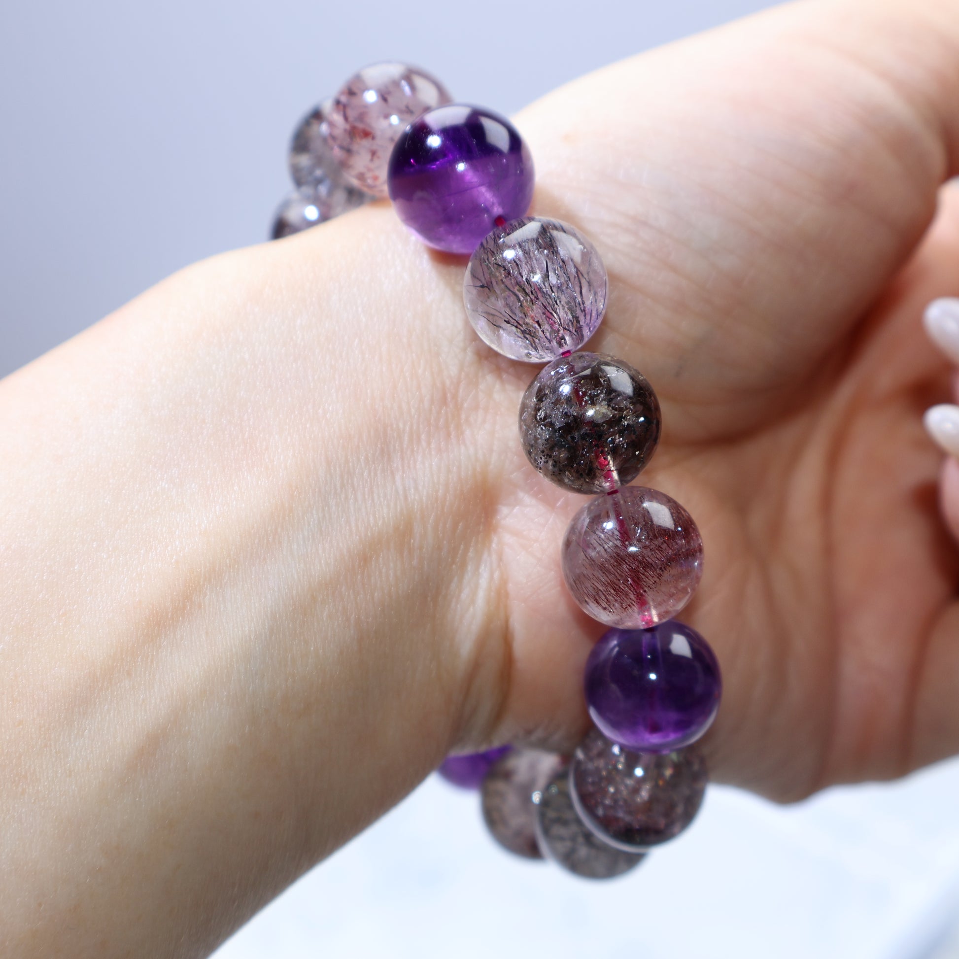 Wrist angle highlighting inclusion distribution across the bracelet