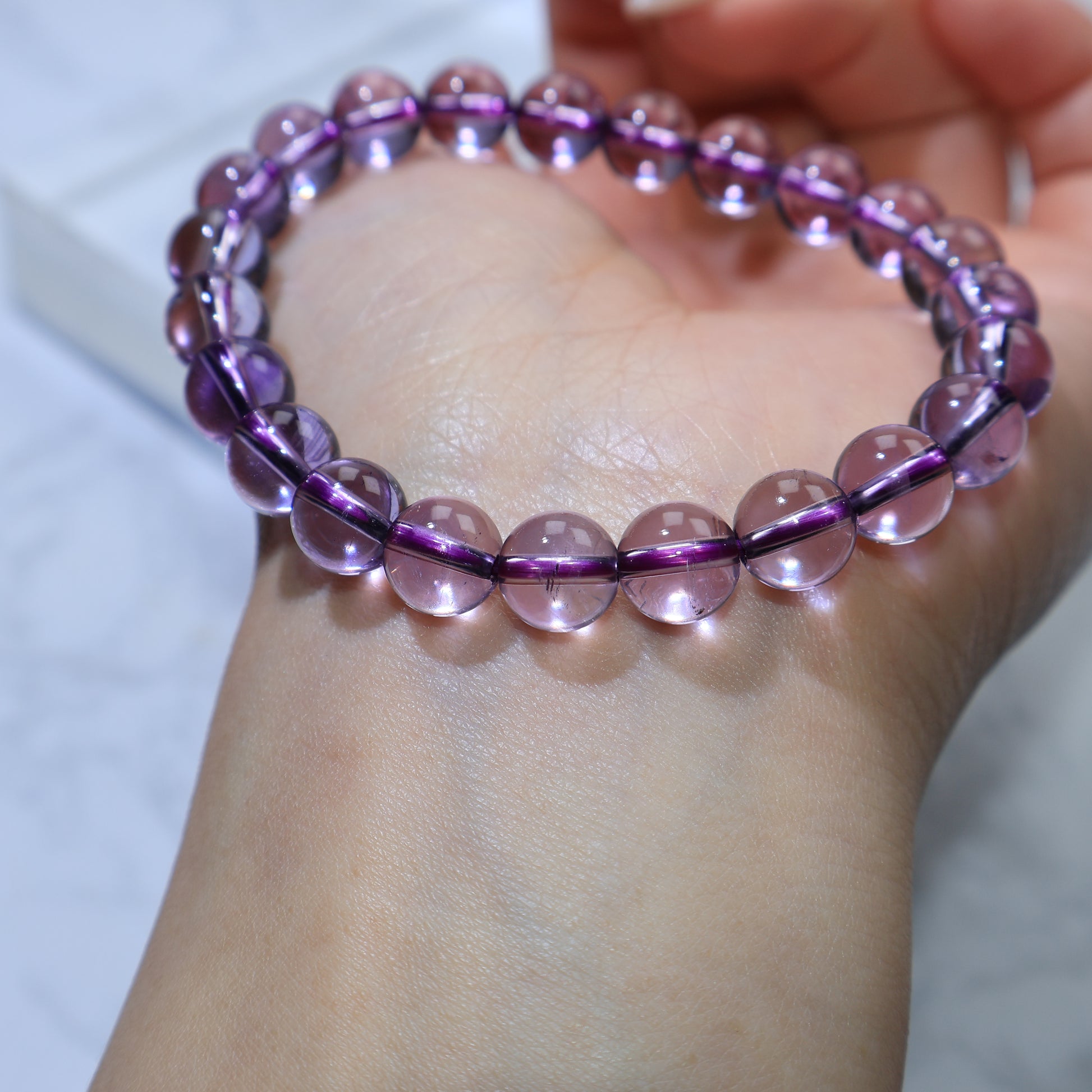 Side view on wrist, displaying uniform bead arrangement and shine