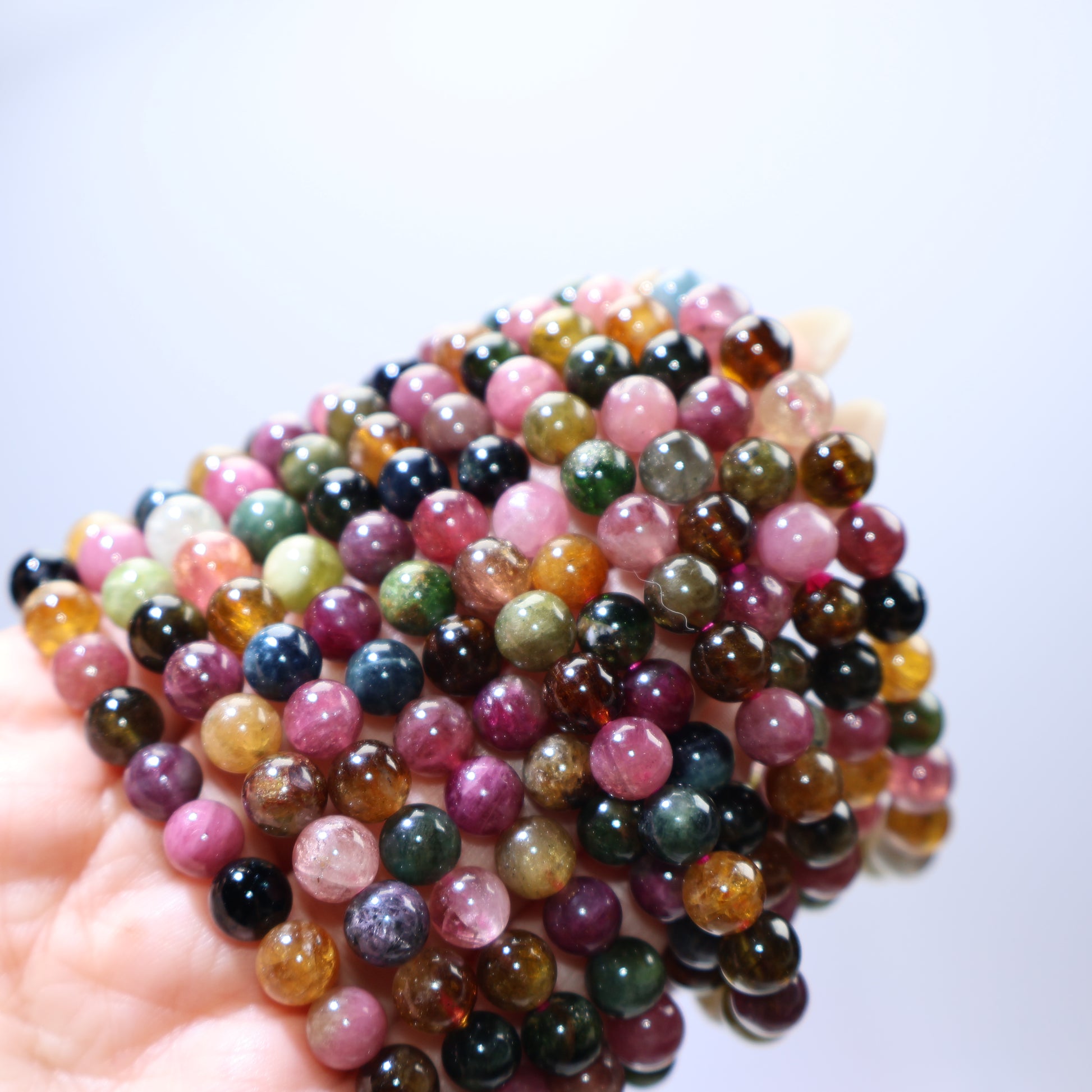 Pile of multiple Multicolor Tourmaline bracelets showing abundant variety