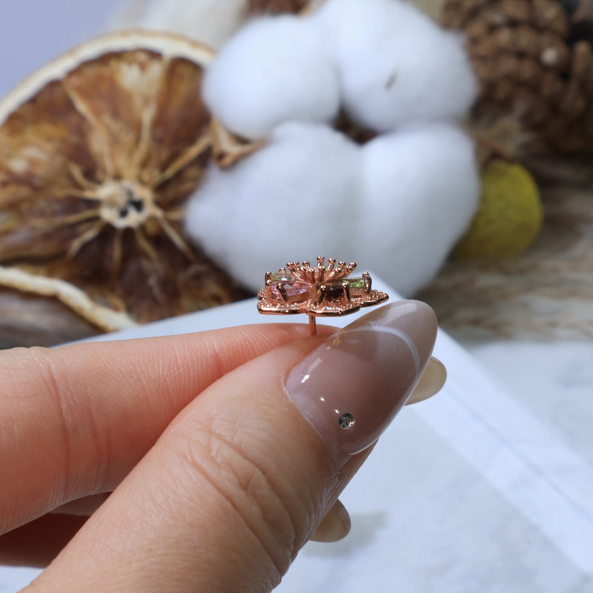 Macro shot focusing on the cubic zirconia accents and polished silver finish