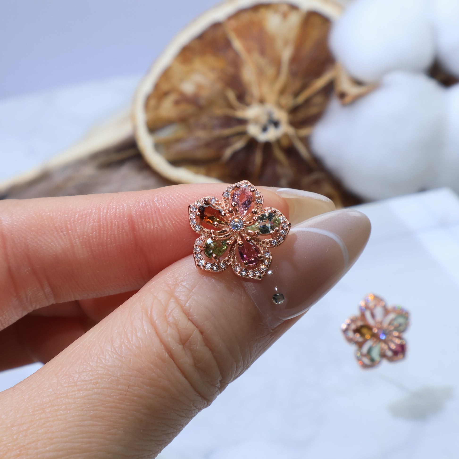 Earrings displayed on marble background for a luxurious presentation