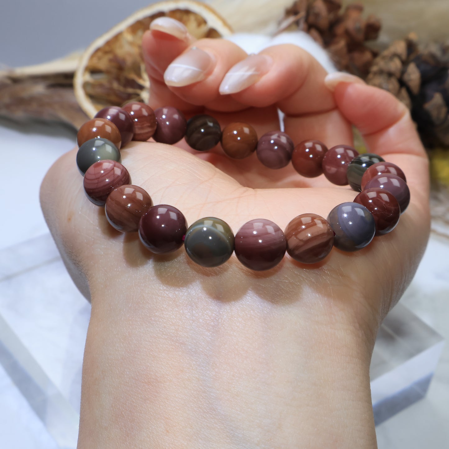 Side view of Alashan Agate bracelet against soft background
