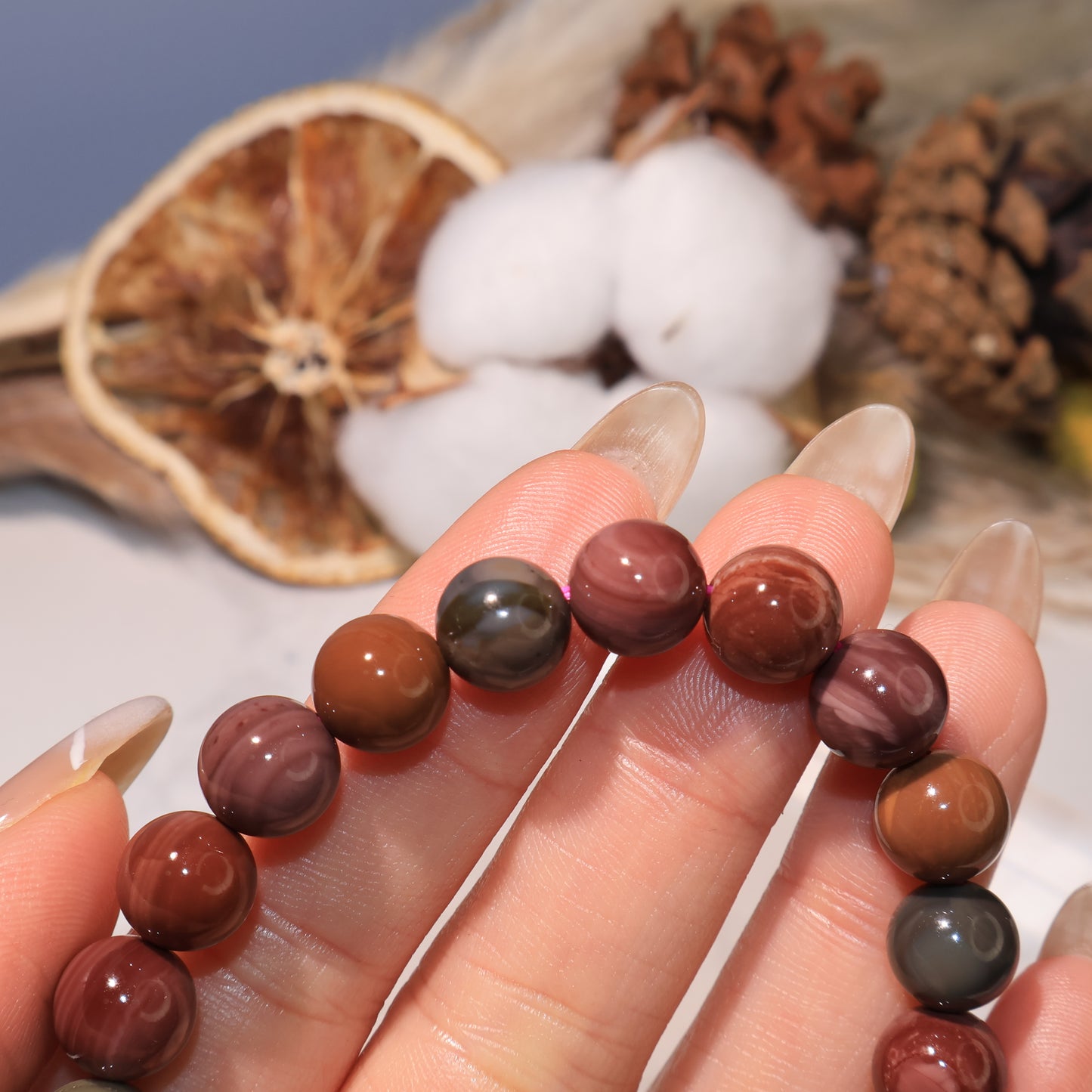 Close-up of Alashan Agate beads showing swirl patterns