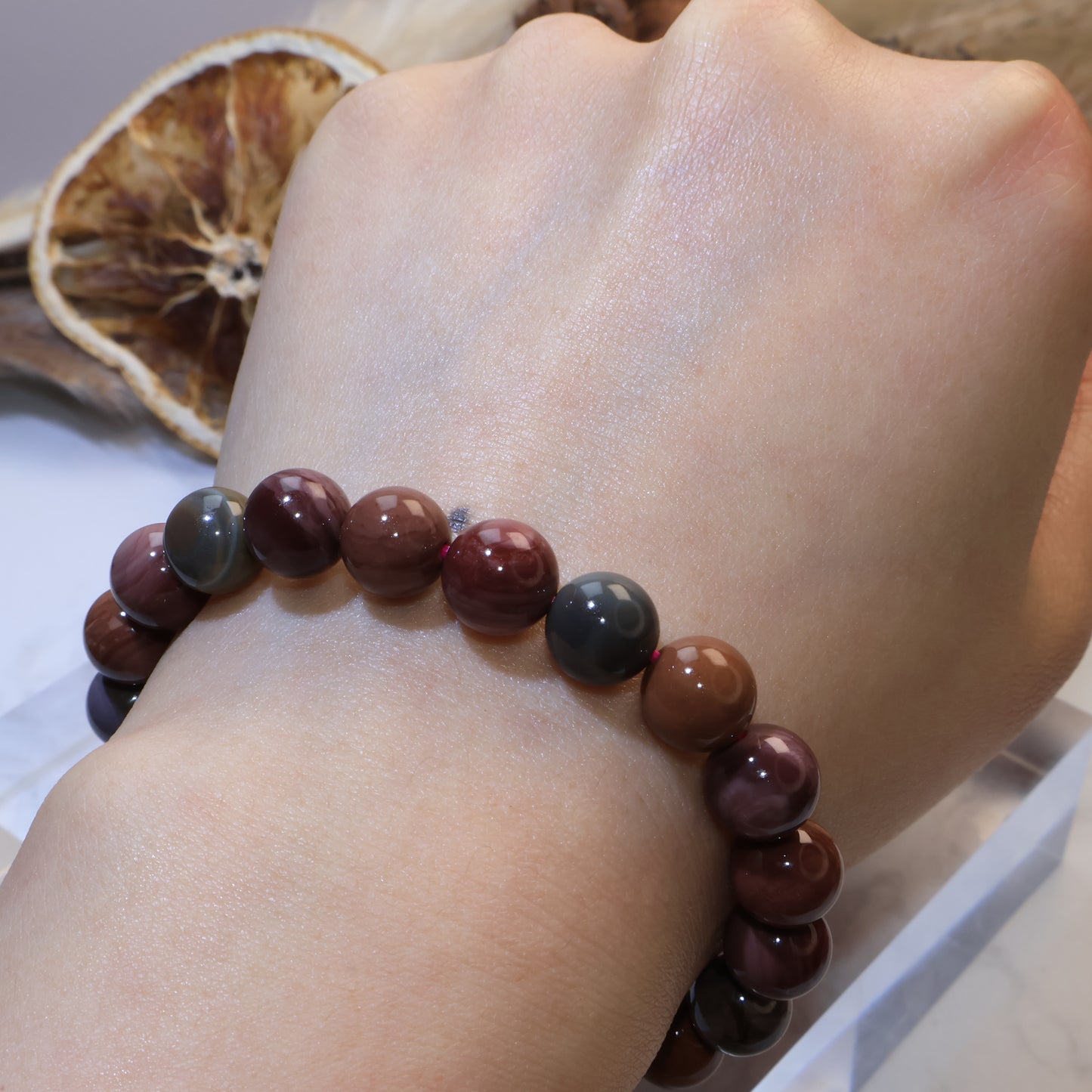 Wrist shot showing full bracelet view with natural colors