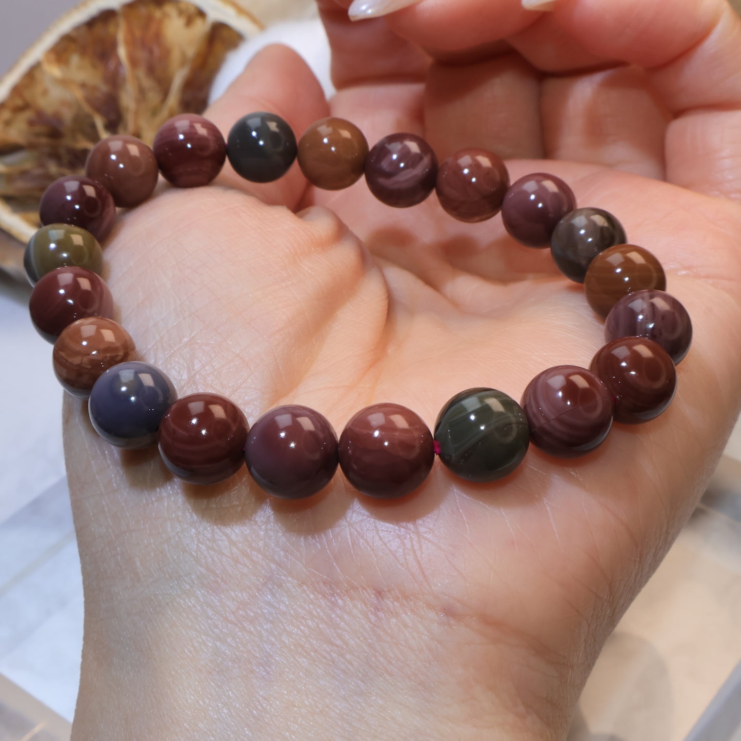 Close-up of Alashan Agate beads showing swirl patterns
