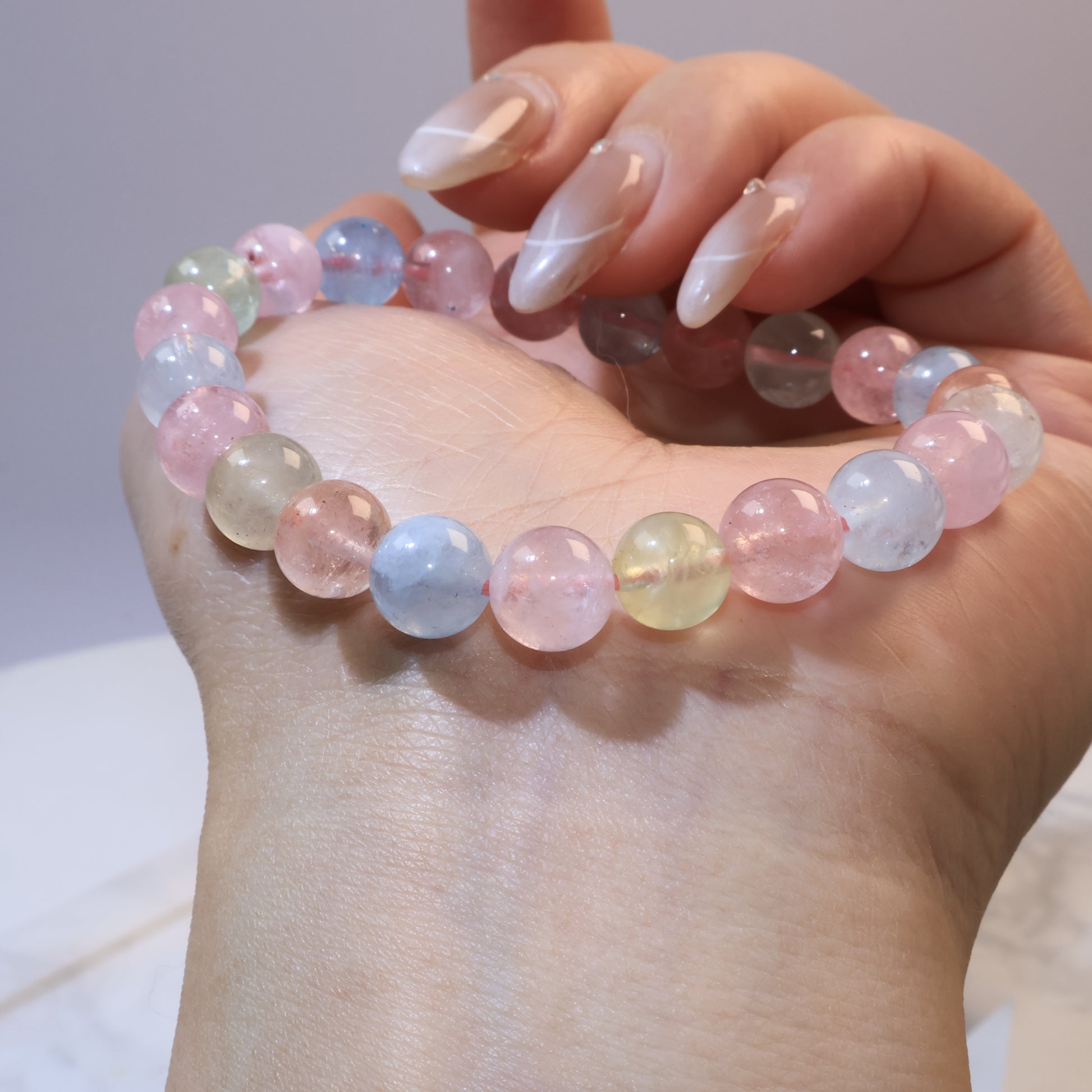 Side angle of Rainbow Morganite bracelet showing smooth polished surface