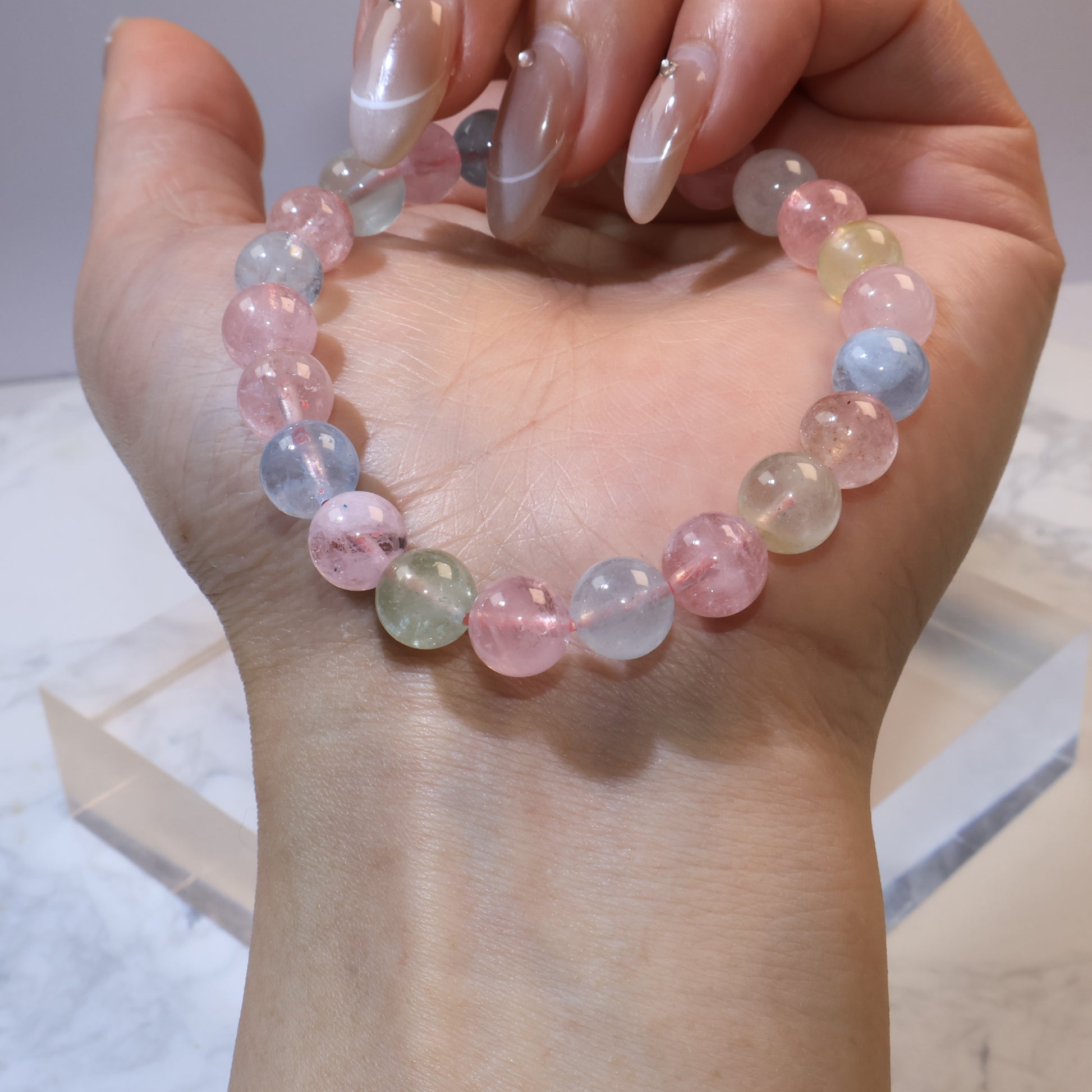 Close-up of Rainbow Morganite bracelet beads highlighting translucent quality