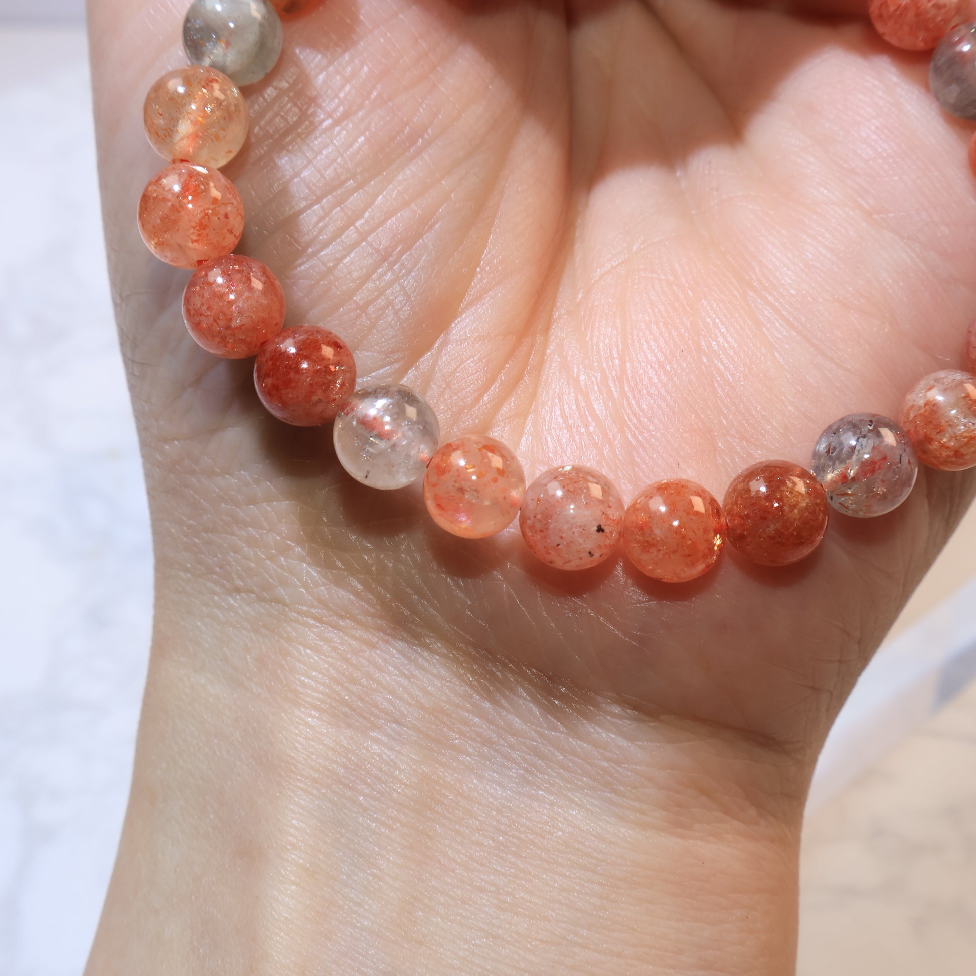 Side angle of Arusha Sunstone bracelet highlighting aventurescence
