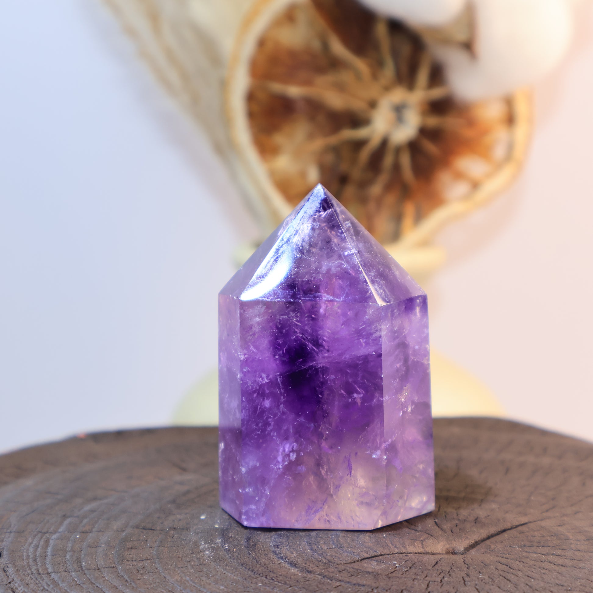 Angled front view with a glowing crystal point