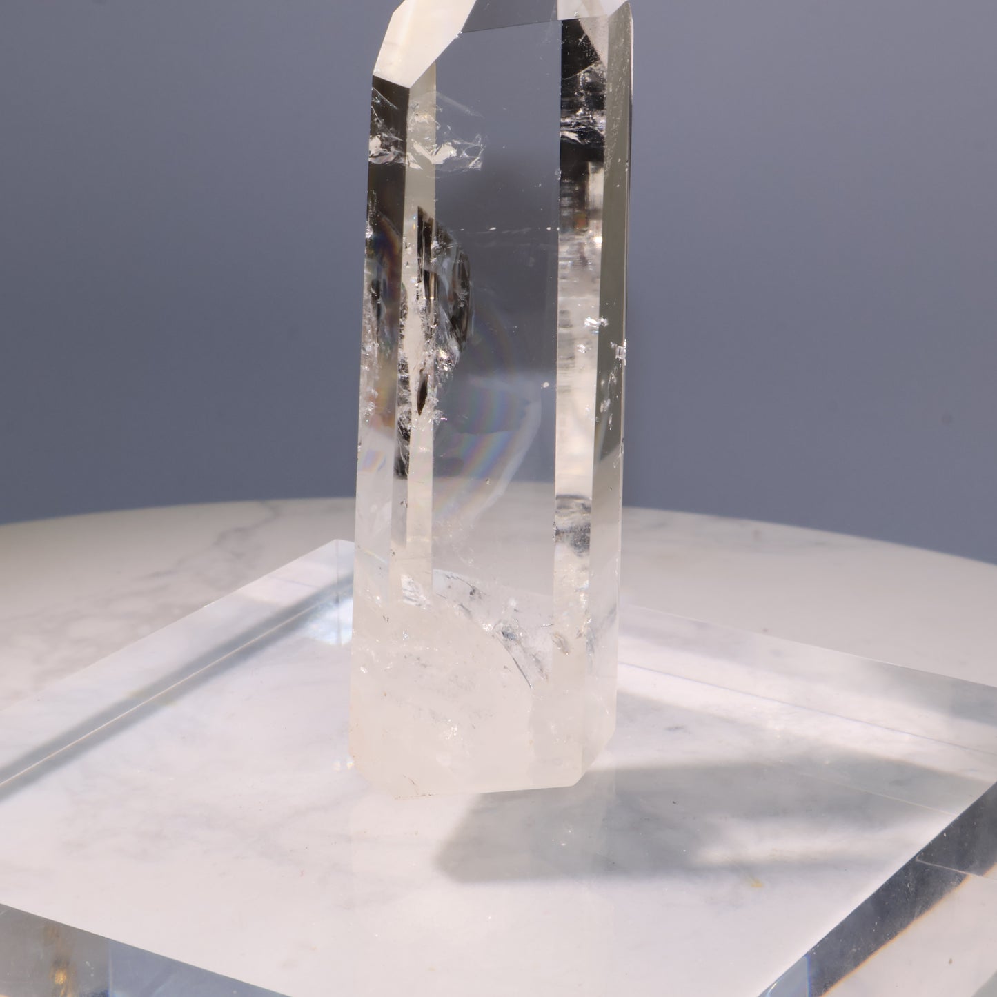 Clear Quartz Tower – side view with internal details and natural inclusions.