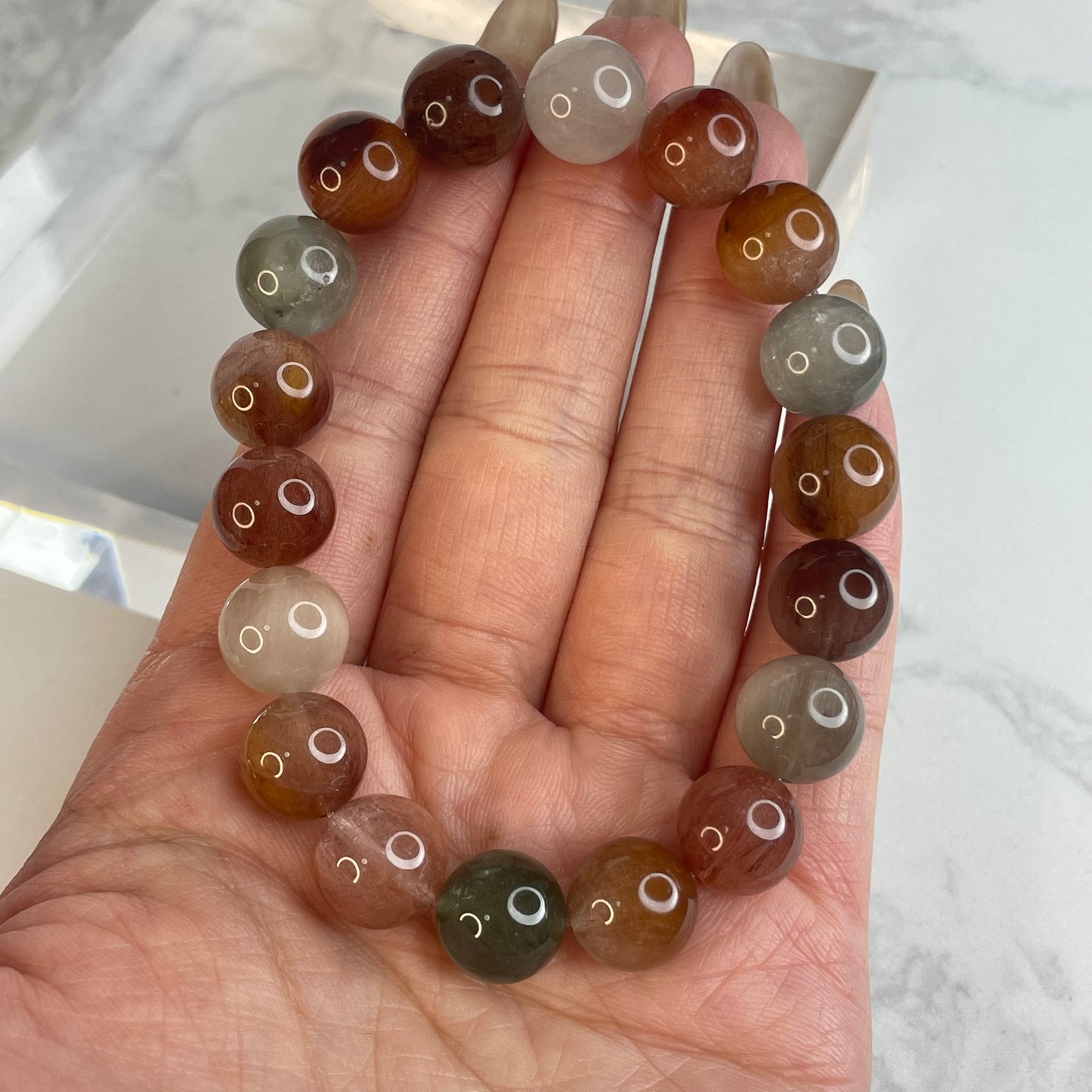 Rainbow Rutile Quartz Bracelet – 11mm Beads | Natural Rabbit Hair Crystal(1)
彩兔毛水晶手串 – 11m