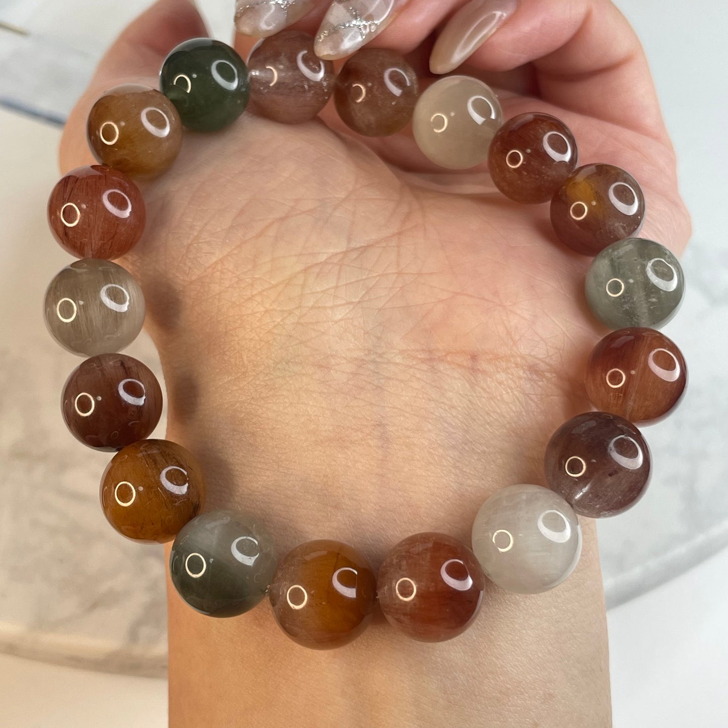 Rainbow Rutile Quartz Bracelet – 11mm Beads | Natural Rabbit Hair Crystal(1)
彩兔毛水晶手串 – 11m