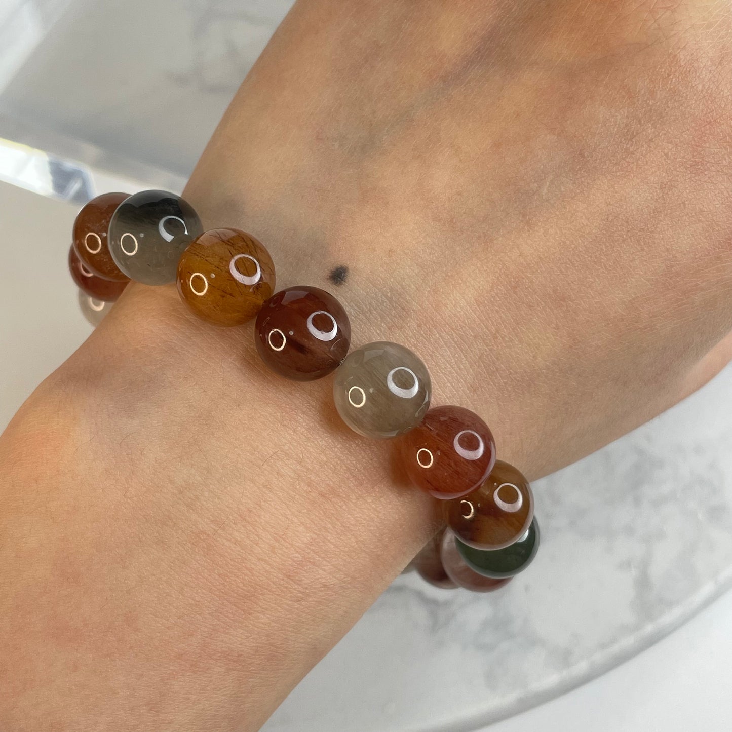 Rainbow Rutile Quartz Bracelet – 11mm Beads | Natural Rabbit Hair Crystal(1)
彩兔毛水晶手串 – 11m