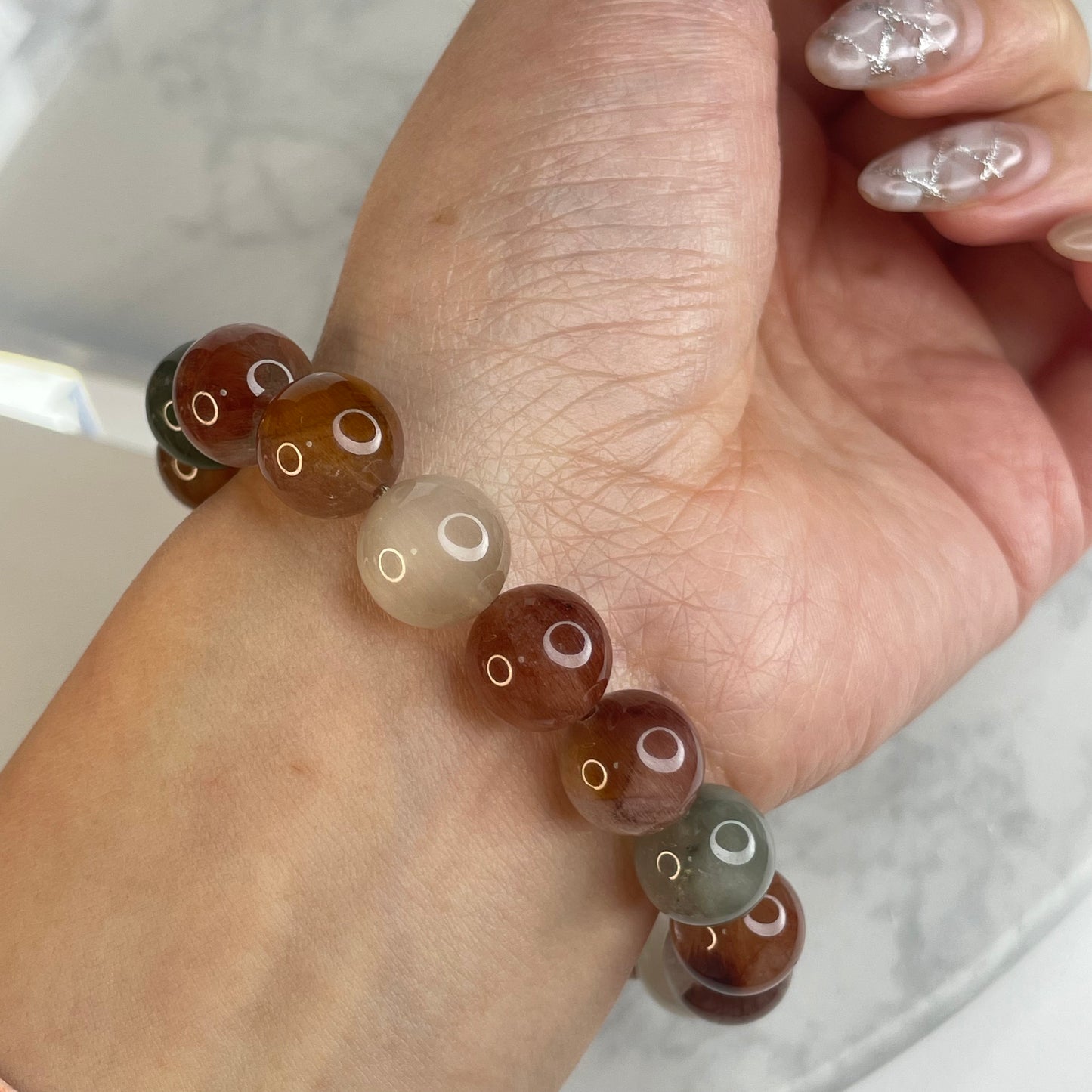 Rainbow Rutile Quartz Bracelet – 11mm Beads | Natural Rabbit Hair Crystal(1)
彩兔毛水晶手串 – 11m