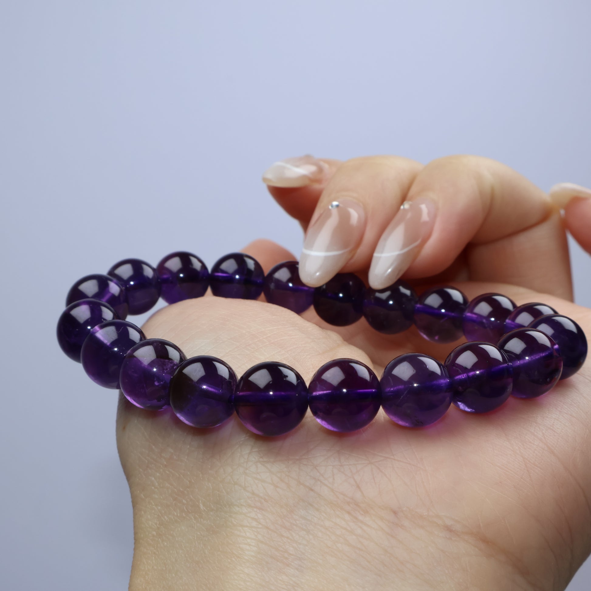 Close-up on hand emphasizing rich color and roundness 