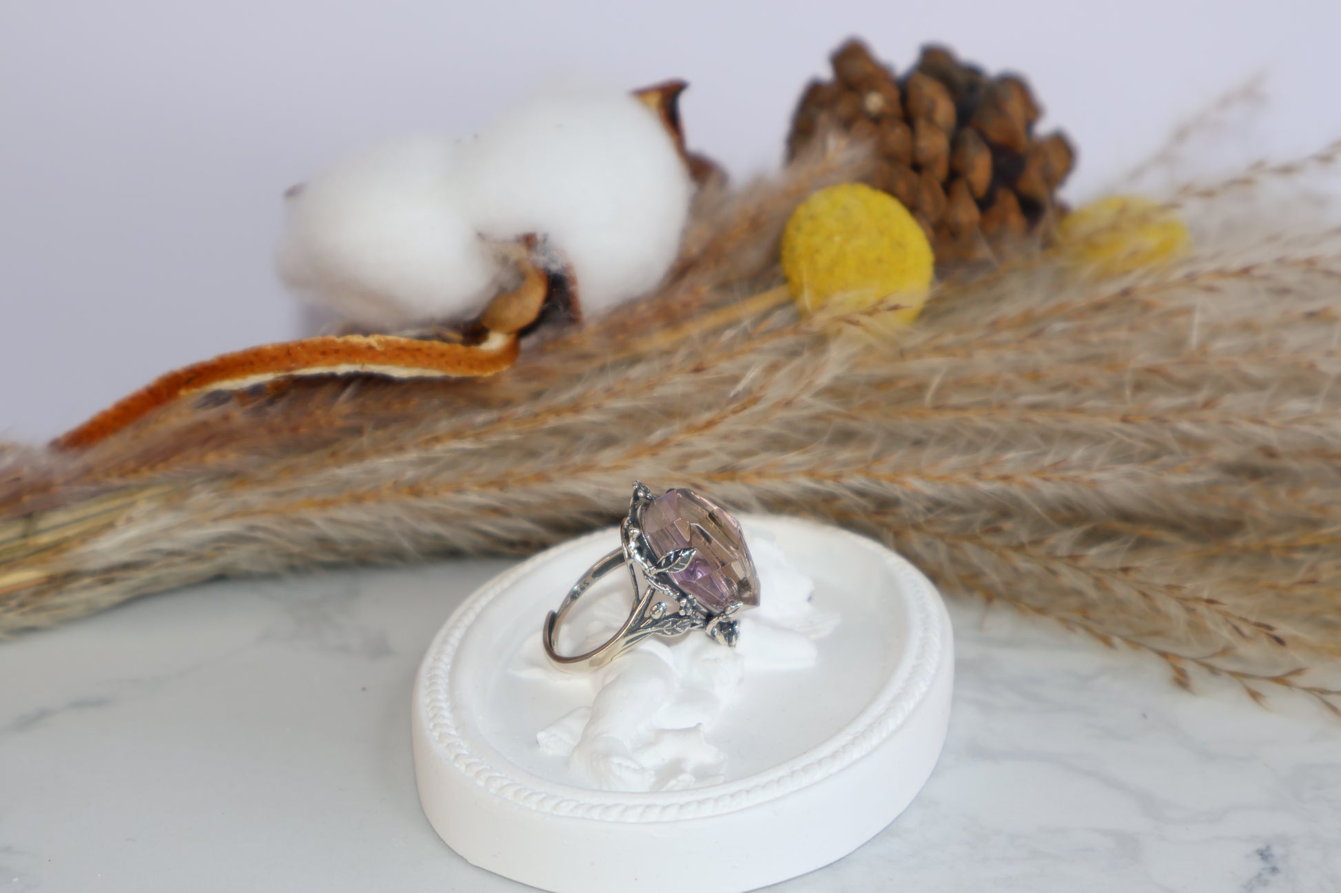Side view of vintage floral Ametrine ring with detailed silver setting