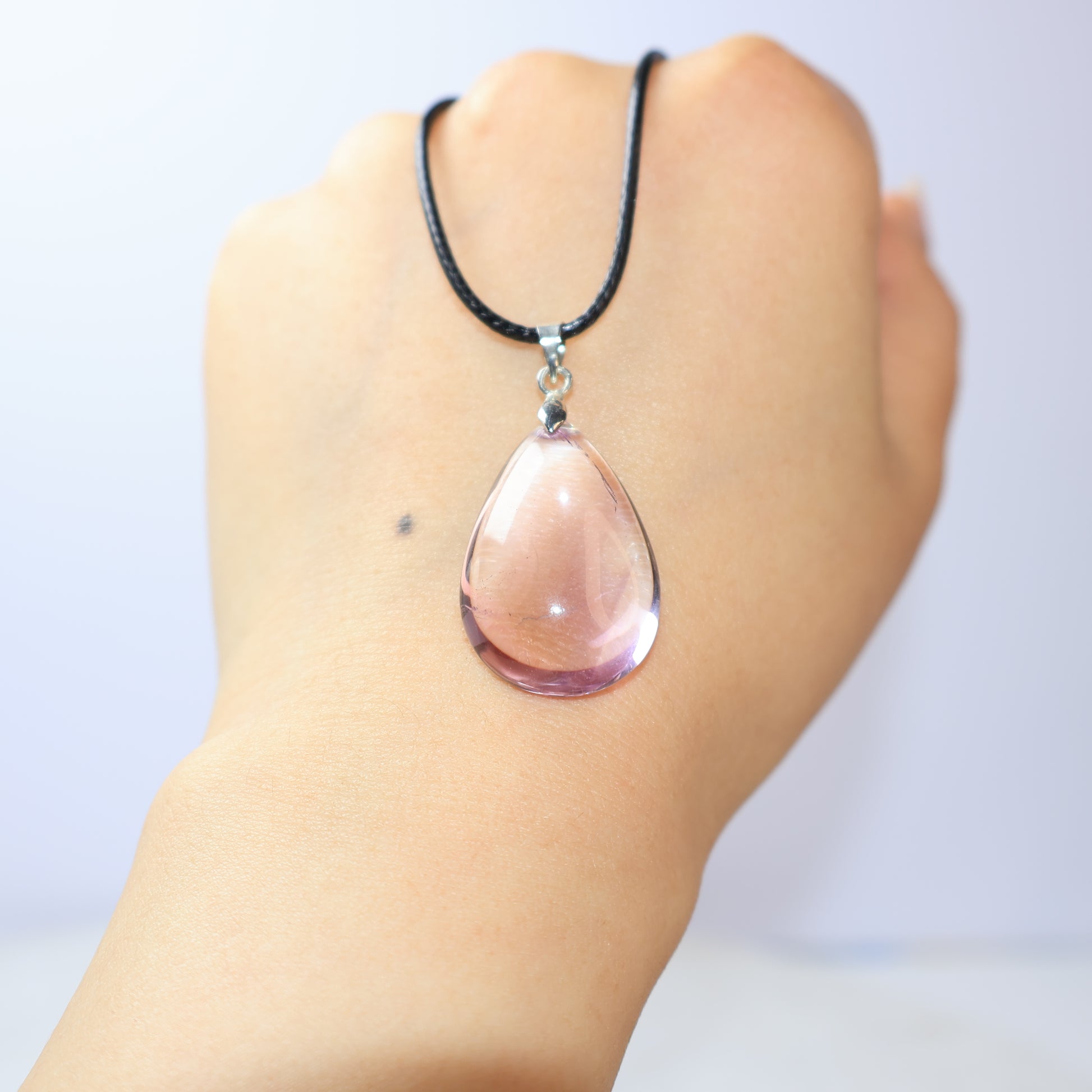 Natural purple and yellow crystal pendant