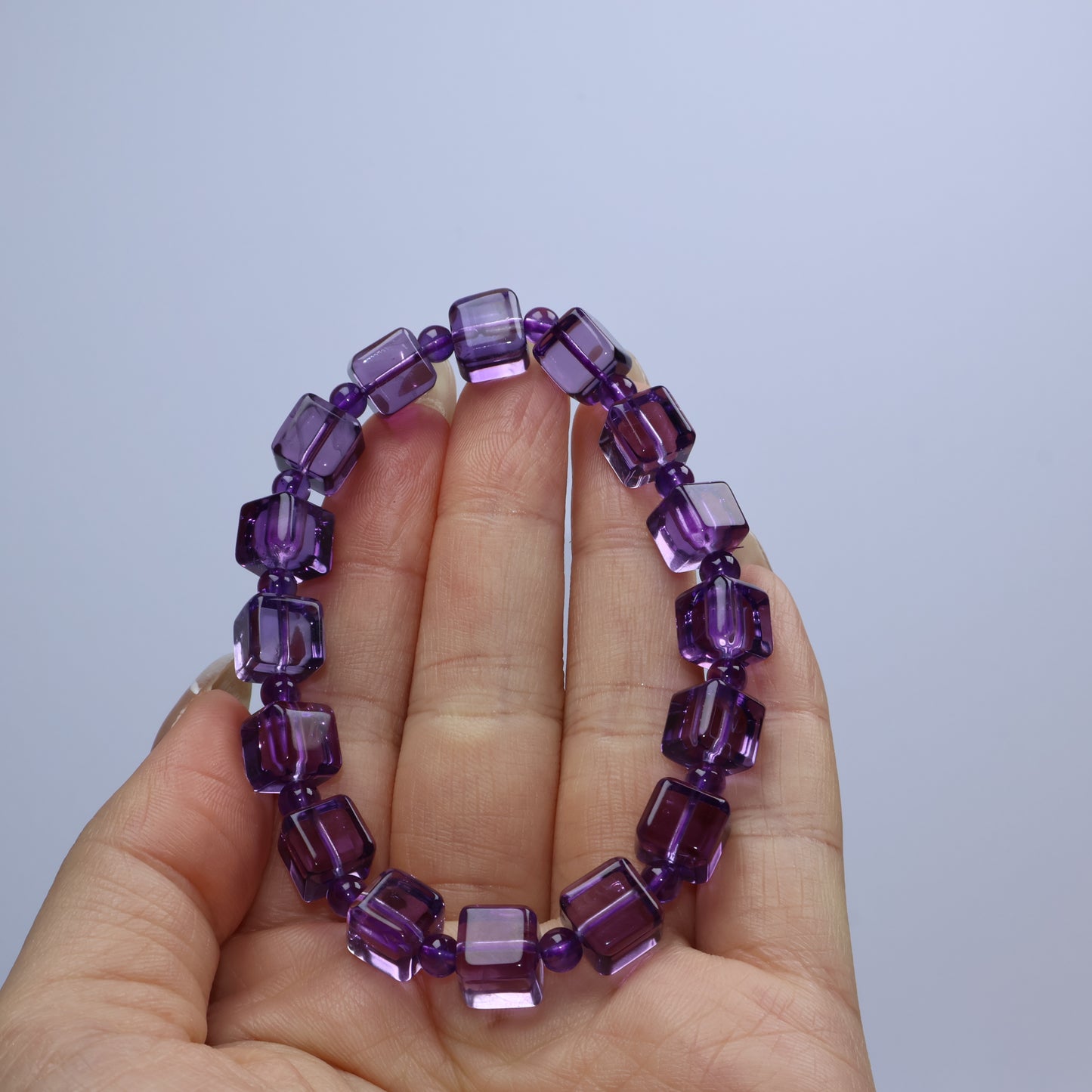 Handheld shot showing vivid purple tones and bead details