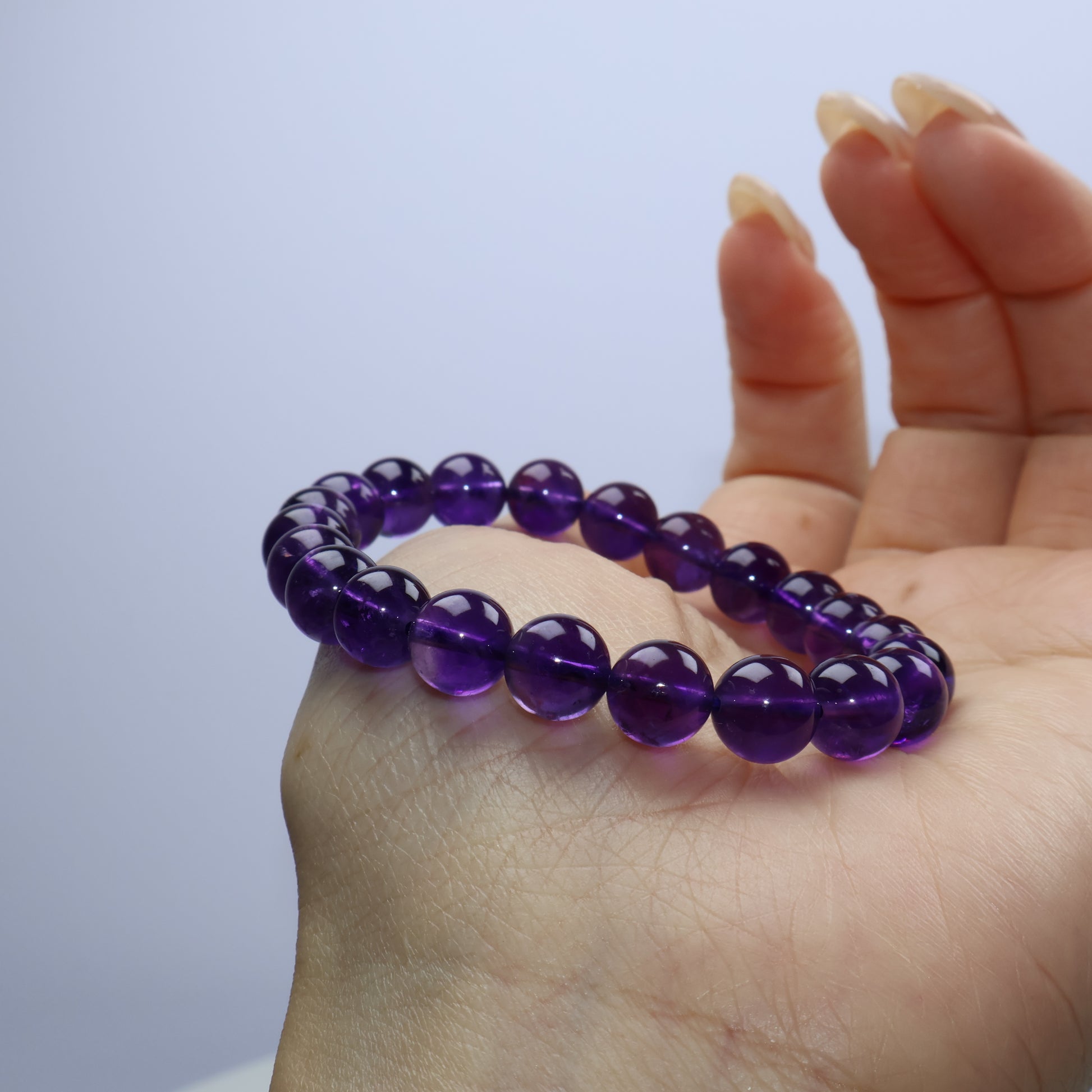Side angle of bracelet across wrist showcasing bead uniformity