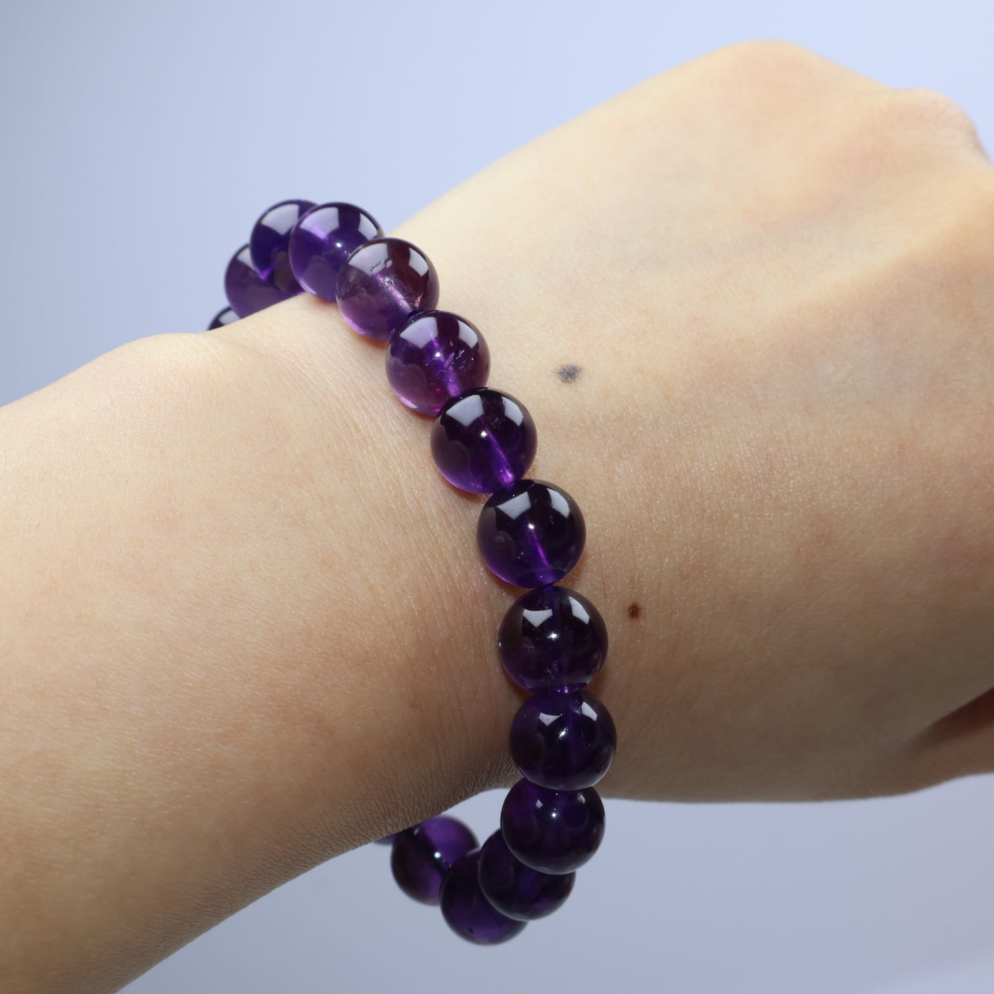 Full bracelet shown draped over hand