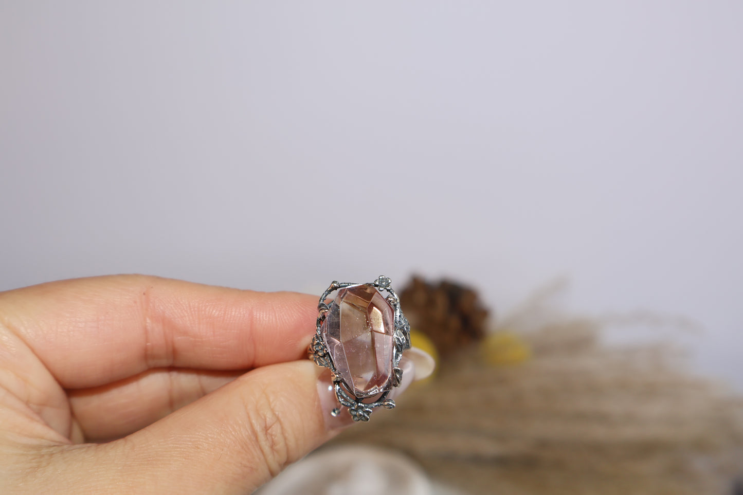 Top view of oval cut Ametrine gemstone in antique silver setting