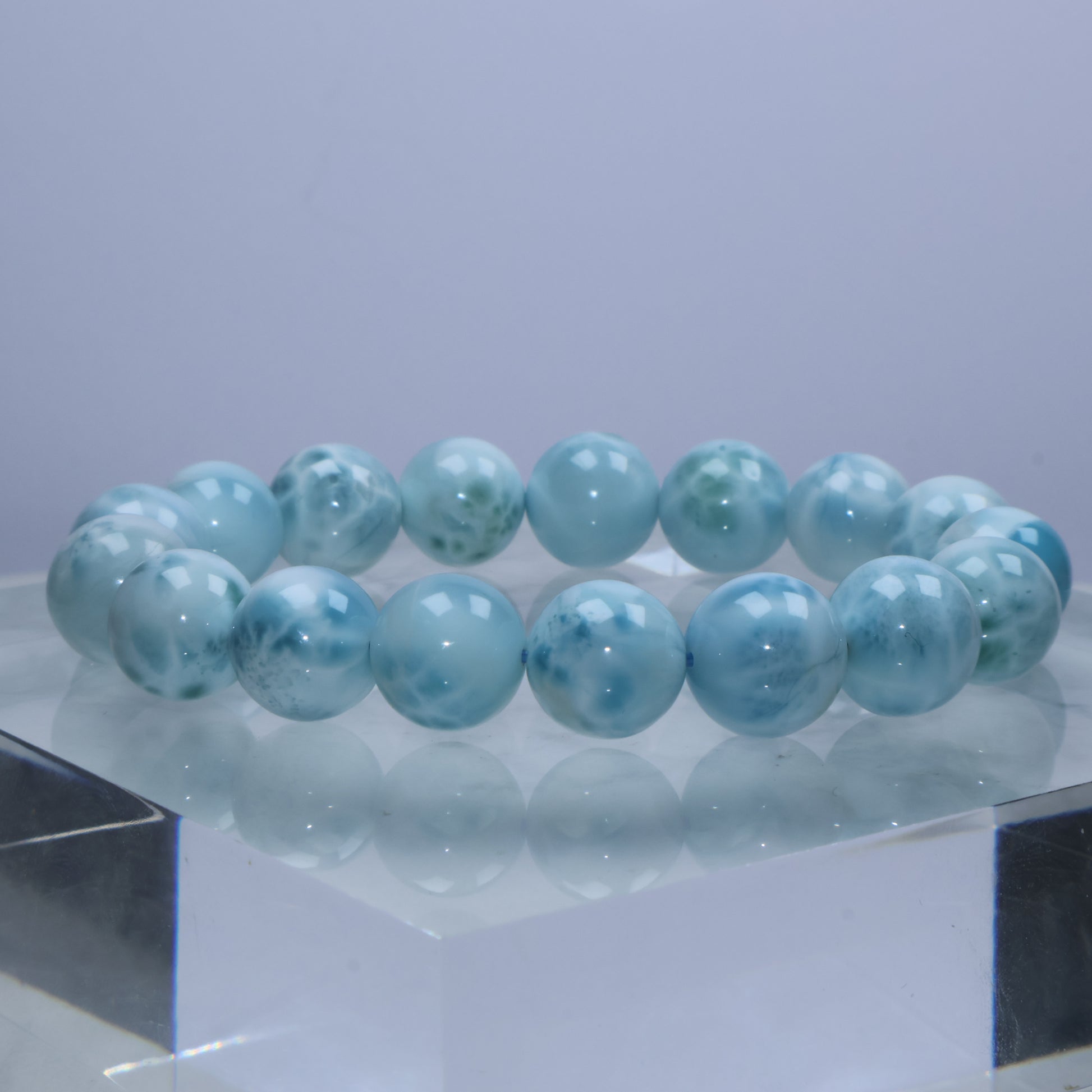 Side view of Larimar bracelet with balanced mix of blue and white beads
