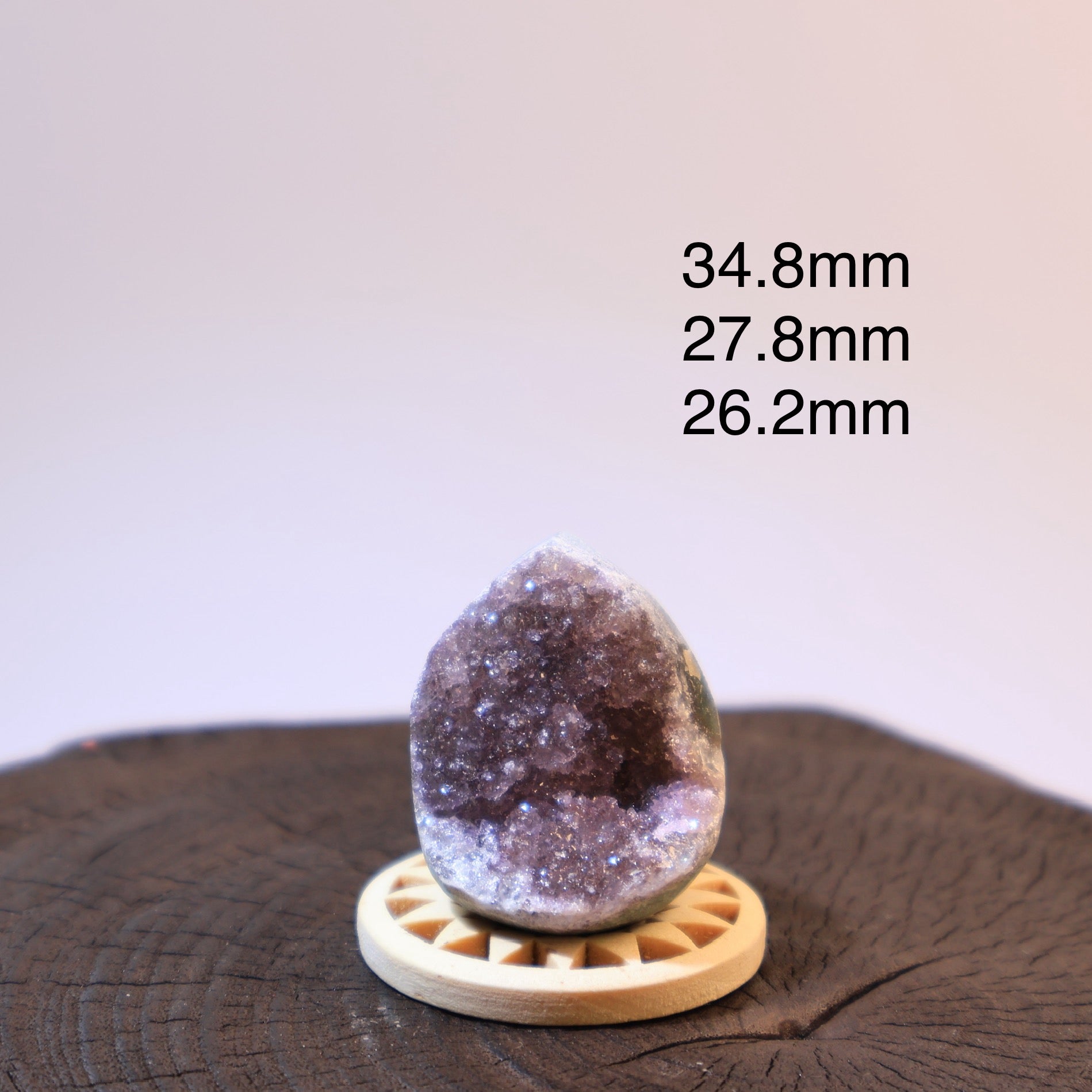 Purple amethyst geode egg, size 34.8 × 27.8 × 26.2 mm, front view.