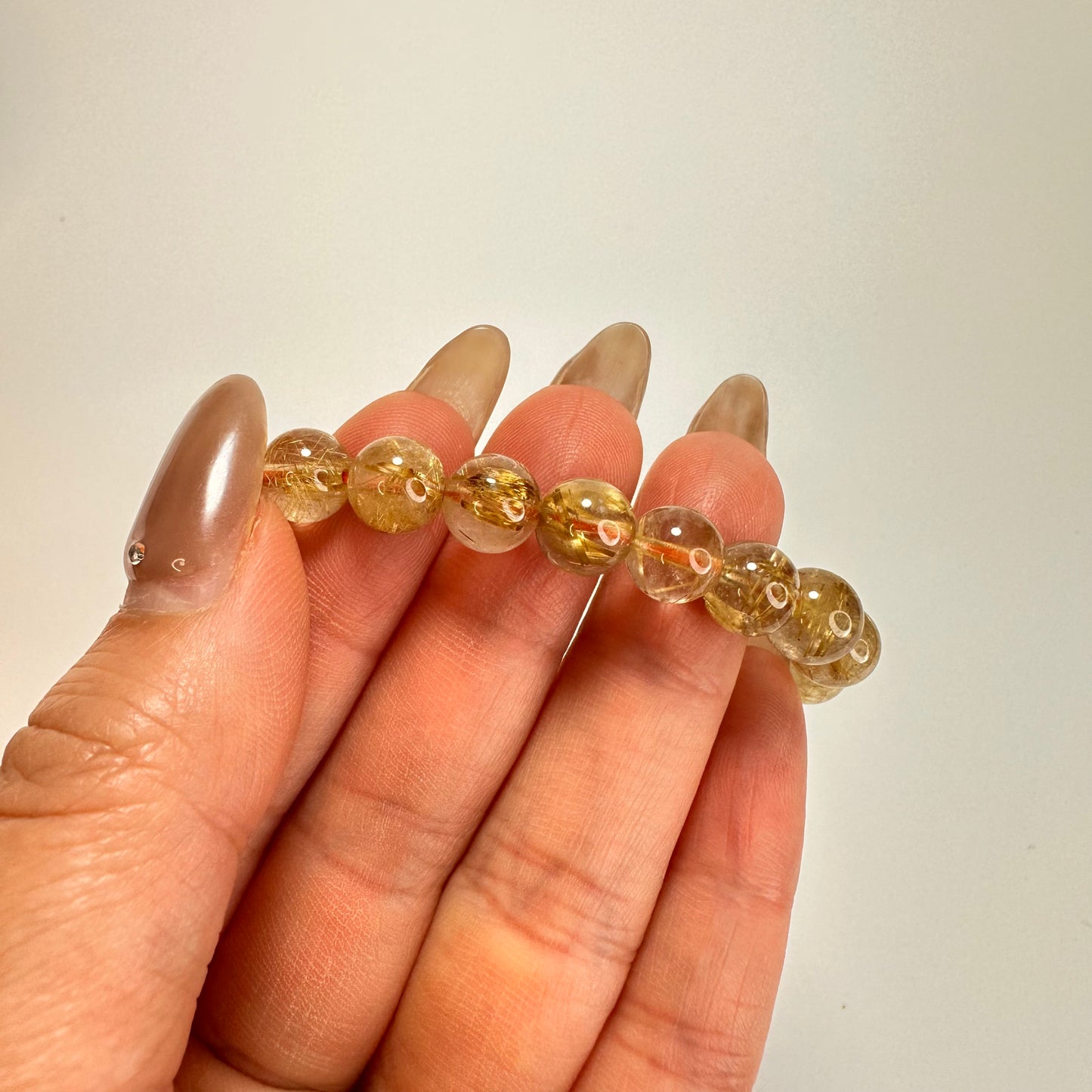 “Celestial Wires” Premium Titanium Rutilated Quartz Bracelet
「星耀金絲」頂級鈦金髮晶手串 – 8mm（Brazil 巴西）